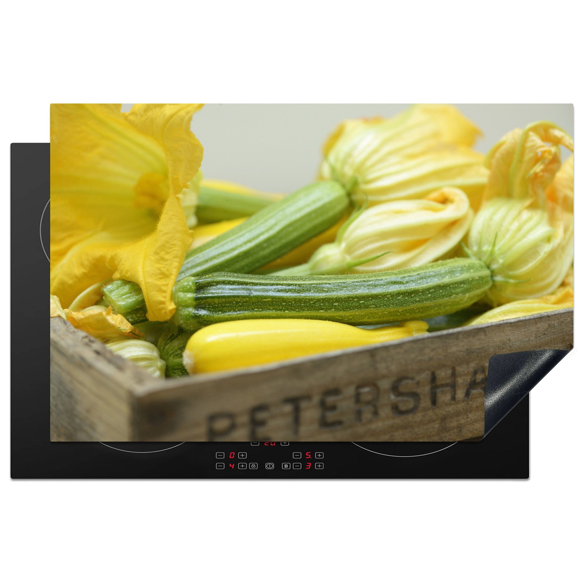 MuchoWow Herdblende-/Abdeckplatte Gelbe und grüne Zucchini mit Blumen in einer Holzkiste, Vinyl, (1 tlg), 81x52 cm, Induktionskochfeld Schutz für die küche, Ceranfeldabdeckung
