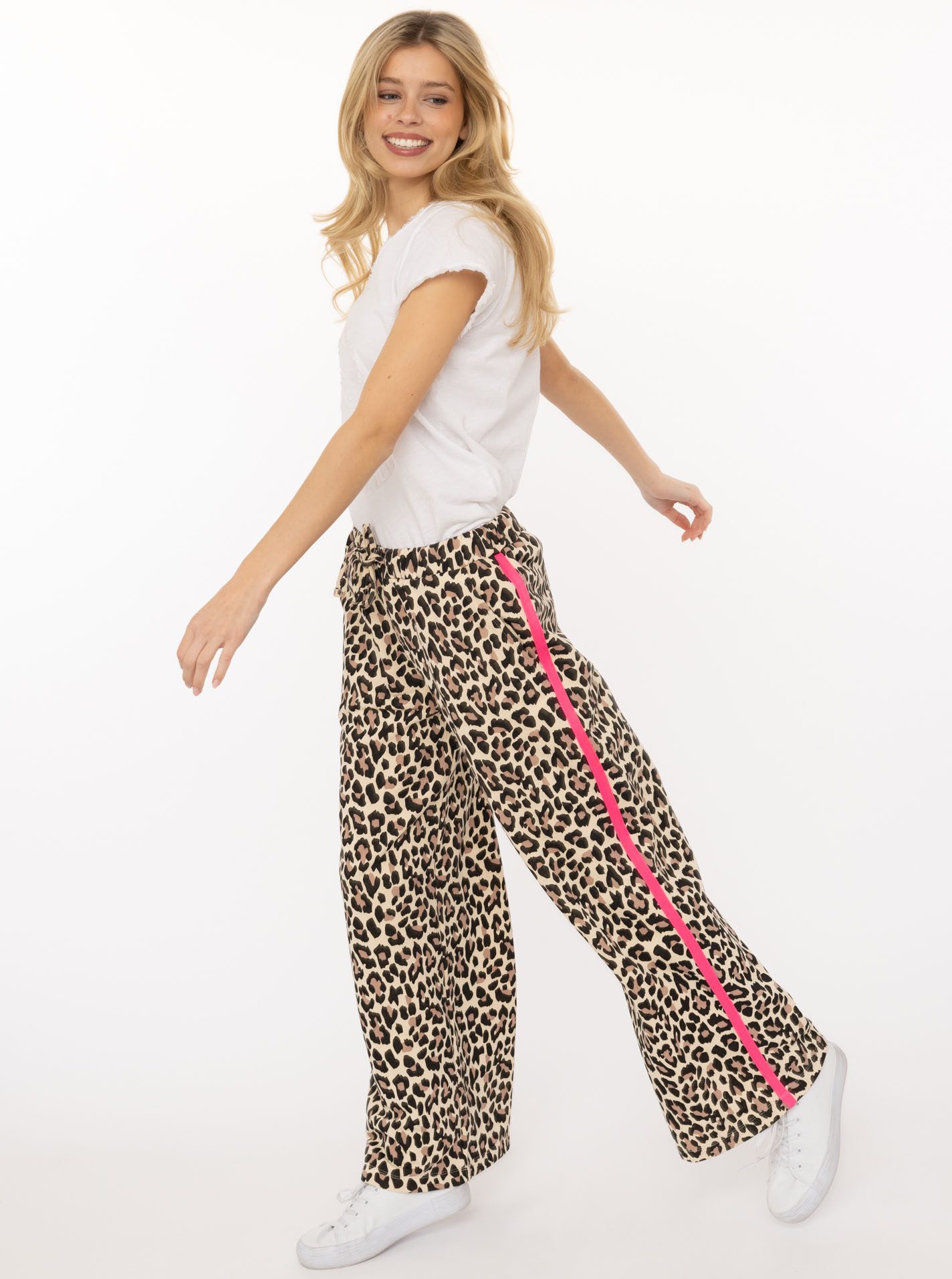 Zwillingsherz Sweathose "Leo" Leo Muster, pinker Streifen an der Seite, Eingriffstaschen