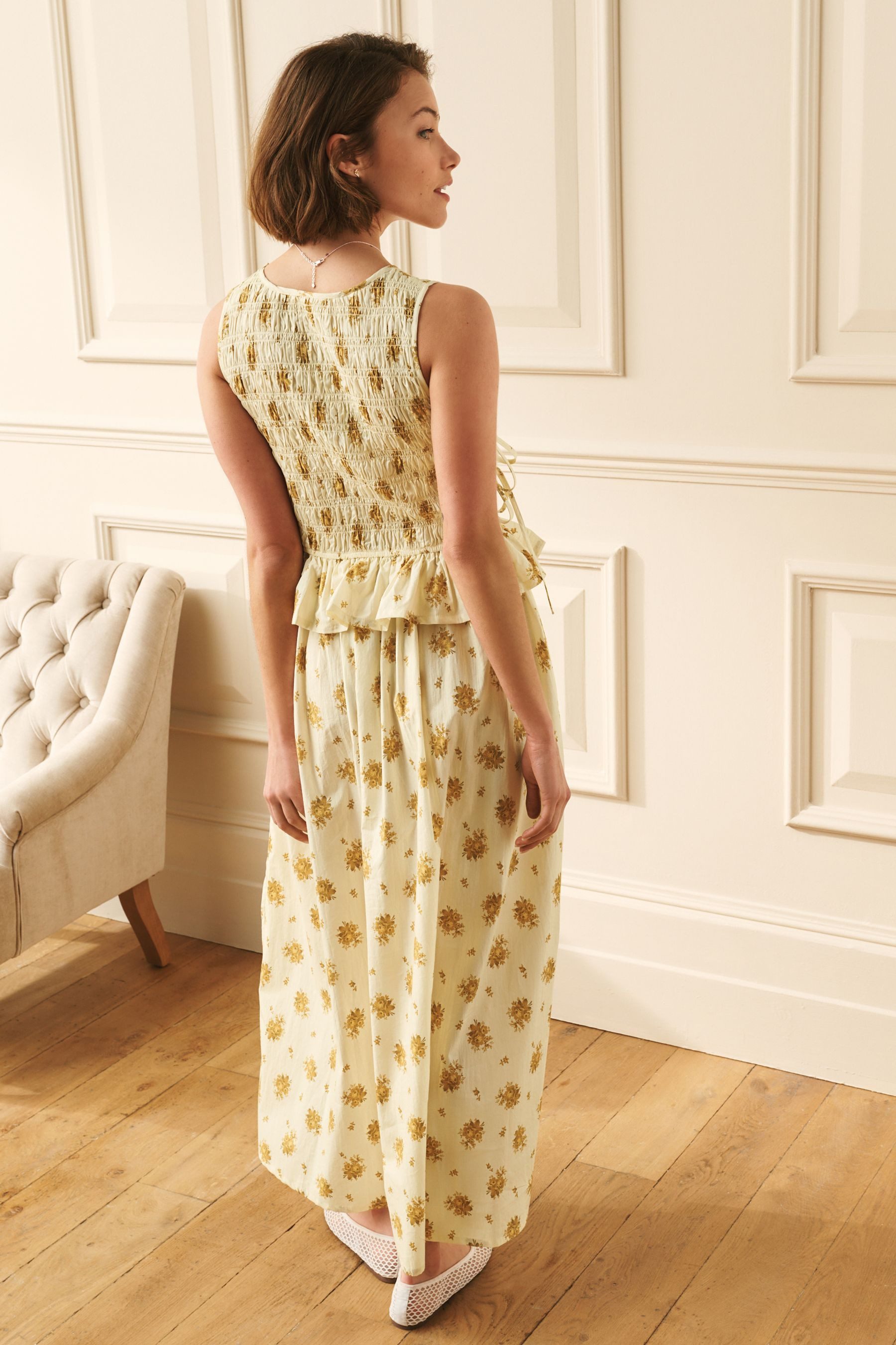 LAURA ASHLEY Druckkleid Laura Ashley ärmelloses Kleid mit floralem Muster (1-tlg)