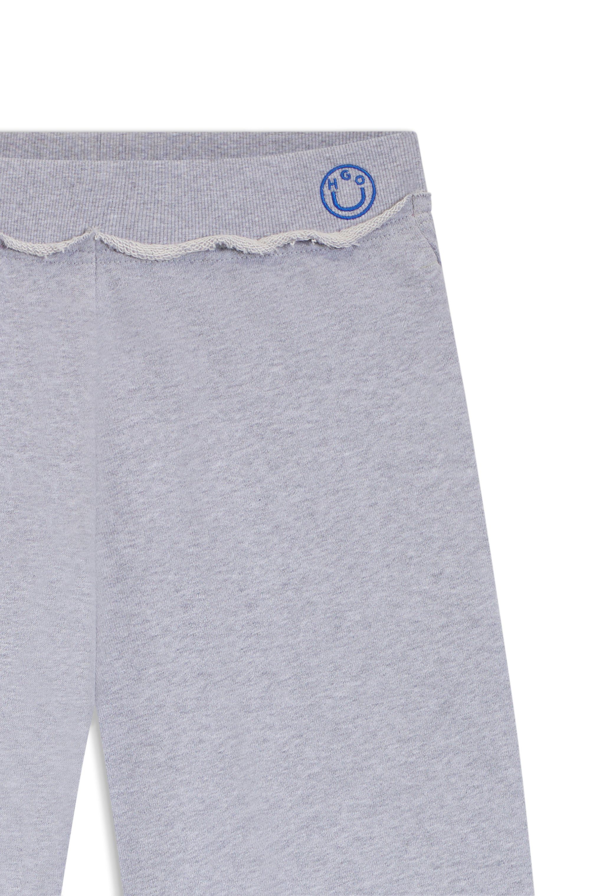 HUGO Jogger Pants Nuwaist mit Raw Cut Hem, weites Bein