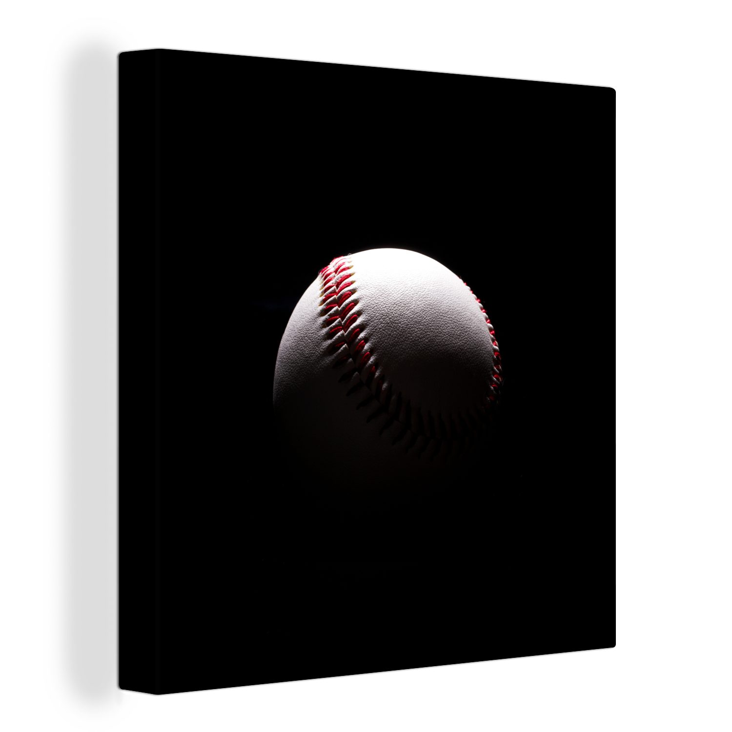 OneMillionCanvasses® Leinwandbild Ein Baseball auf schwarzem Hintergrund, (1 St), Leinwand Bilder für Wohnzimmer Schlafzimmer