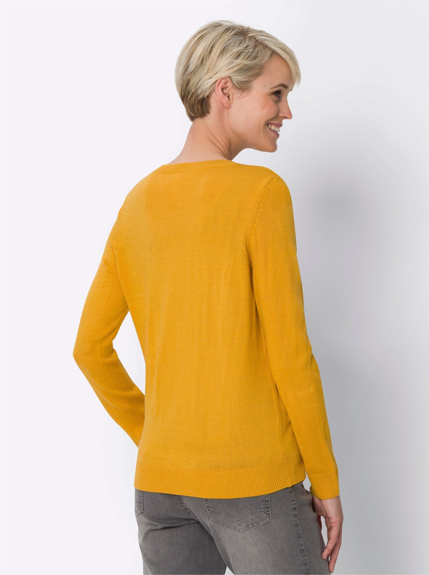 an! Sieh Strickpullover ocker