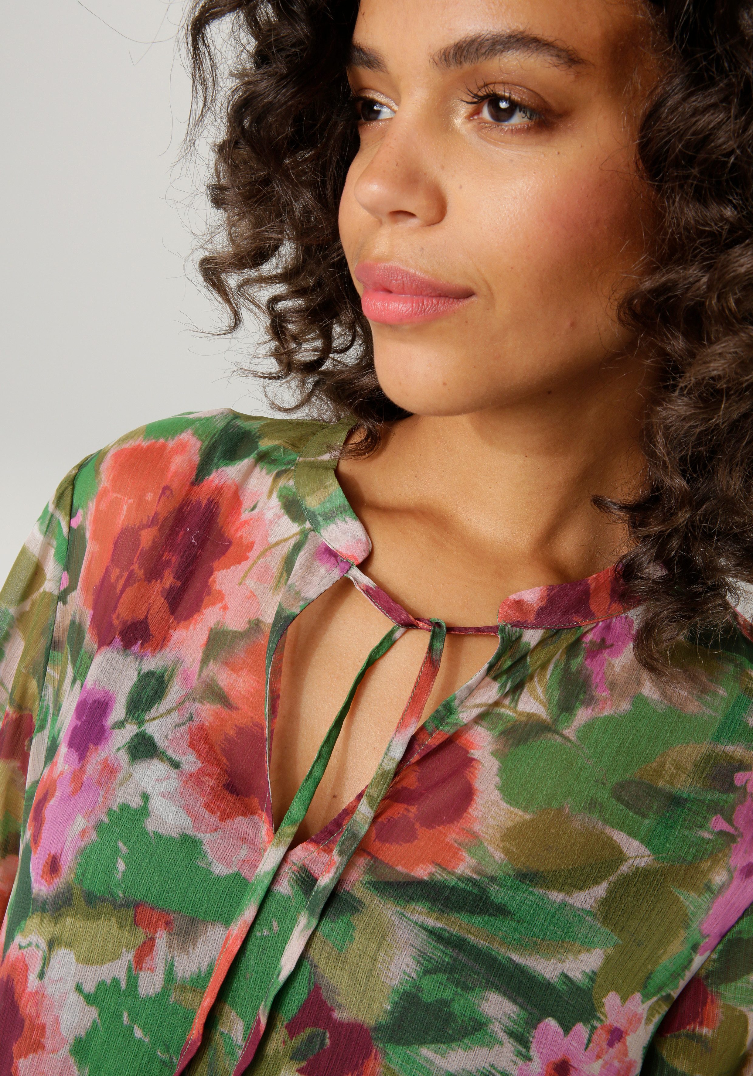 Aniston CASUAL Maxikleid (mit Jersey-Unterkleid) mit farbharmonischem Blumendruck im Batik-Look