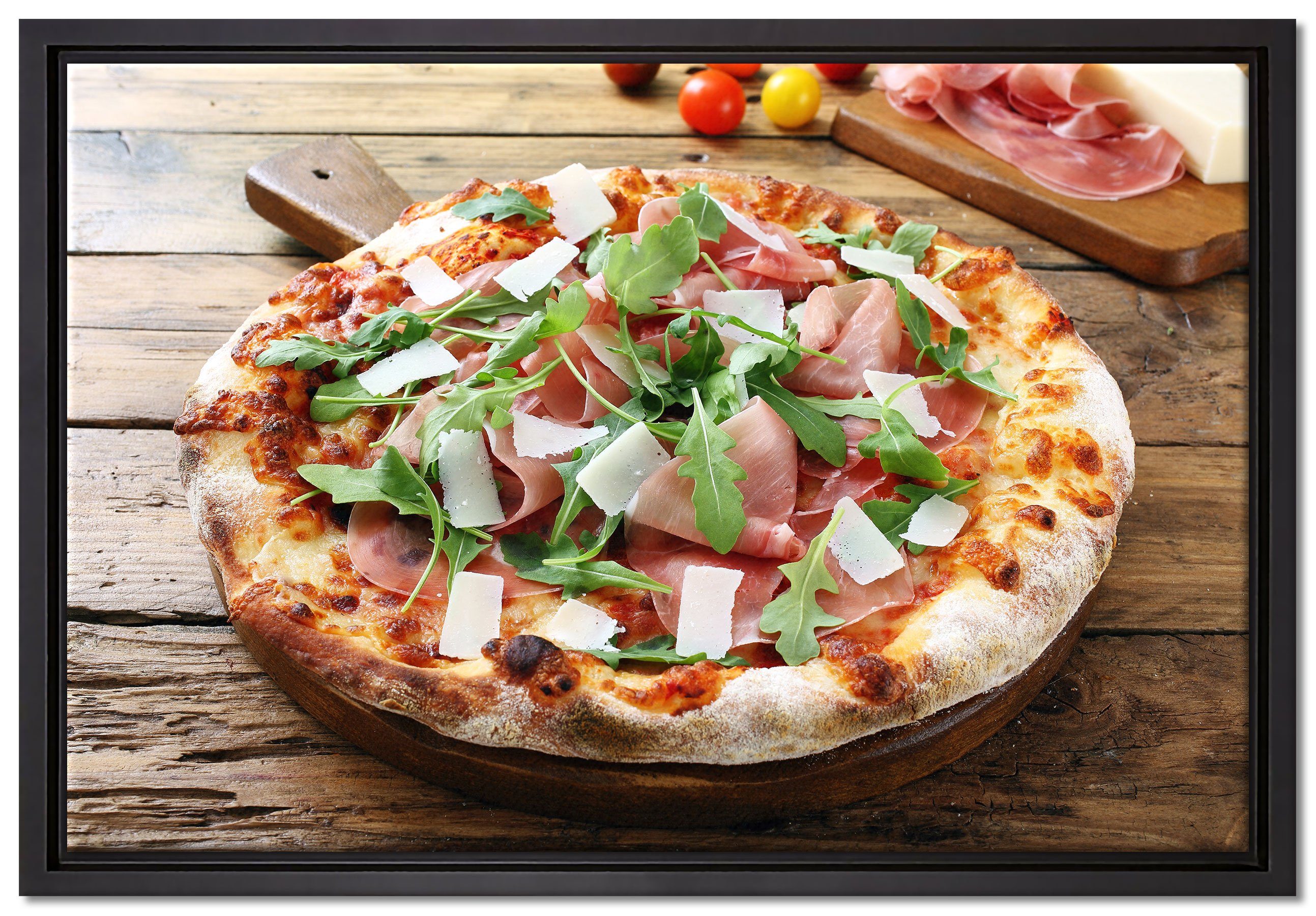 Pixxprint Leinwandbild Prosciutto Pizza auf Holztisch, Wanddekoration (1 St), Leinwandbild fertig bespannt, in einem Schattenfugen-Bilderrahmen gefasst, inkl. Zackenaufhänger