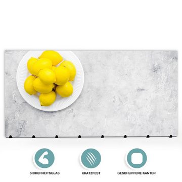 Primedeco Garderobenpaneel Magnetwand und Memoboard aus Glas Zitronen auf Teller