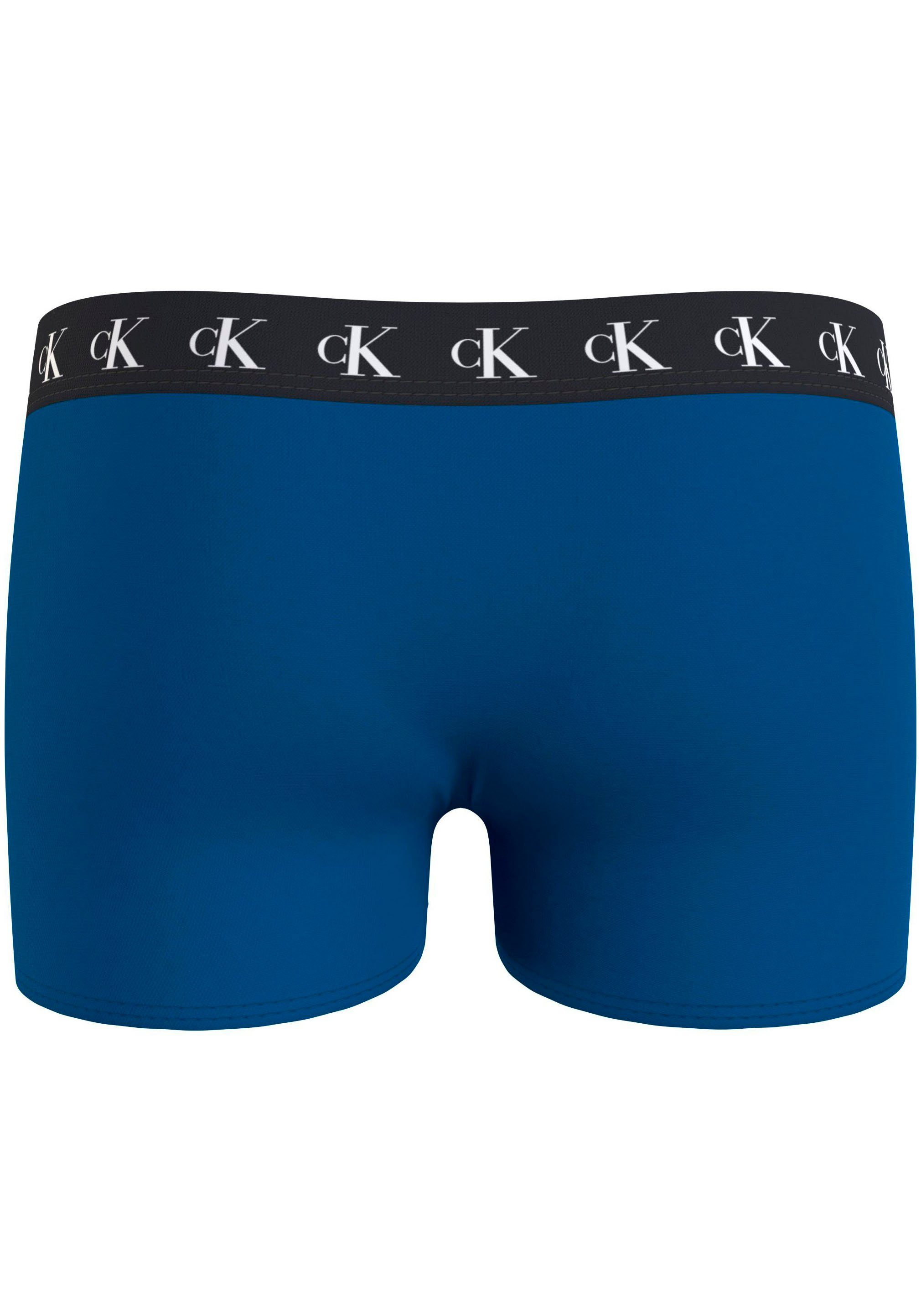 Calvin Klein Underwear Slip 3PK mit 3er-Pack) am (Packung, TRUNK Calvin Warpedprint/Vibrantorange/Tarpsblue Bund Klein Markenlabel