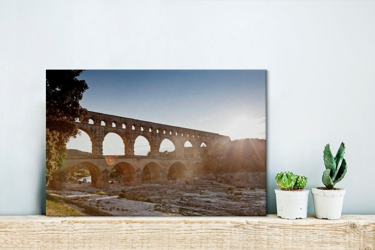 OneMillionCanvasses® Leinwandbild Fantastischer Gard (1 Wanddeko, 30x20 Frankreich, du St), cm Aufhängefertig, in über dem Sonnenuntergang Leinwandbilder, Pont Wandbild