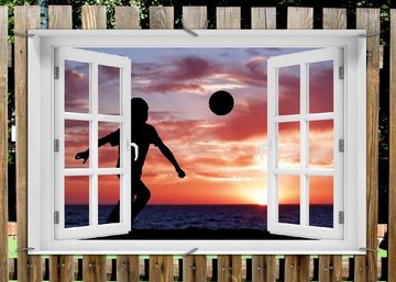Wallario Sichtschutzzaunmatten Fußball - Kleiner Junge spielt im Abendrot, mit Fenster-Illusion