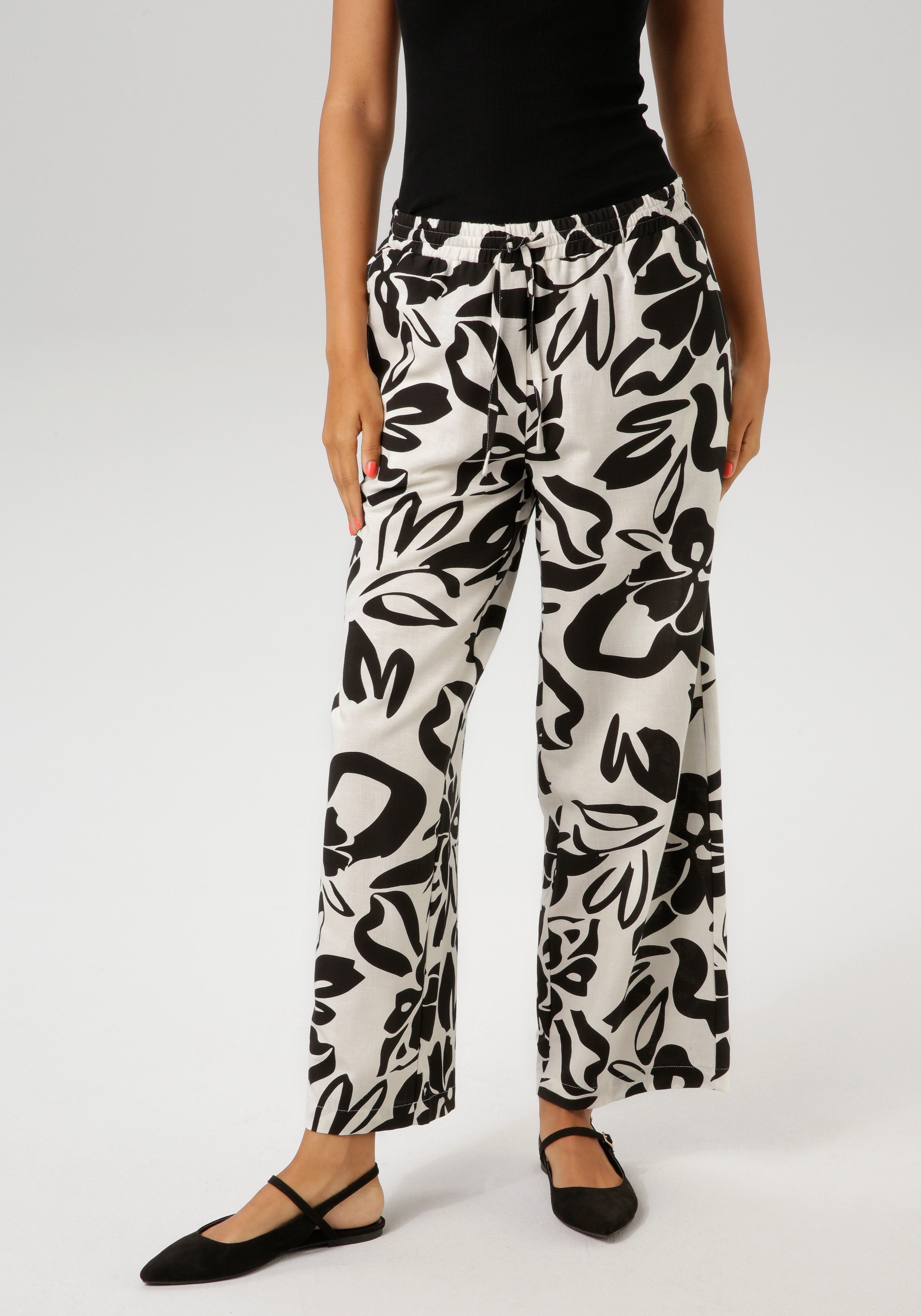 Aniston CASUAL Schlupfhose mit großflächigen Blättern bedruckt günstig online kaufen