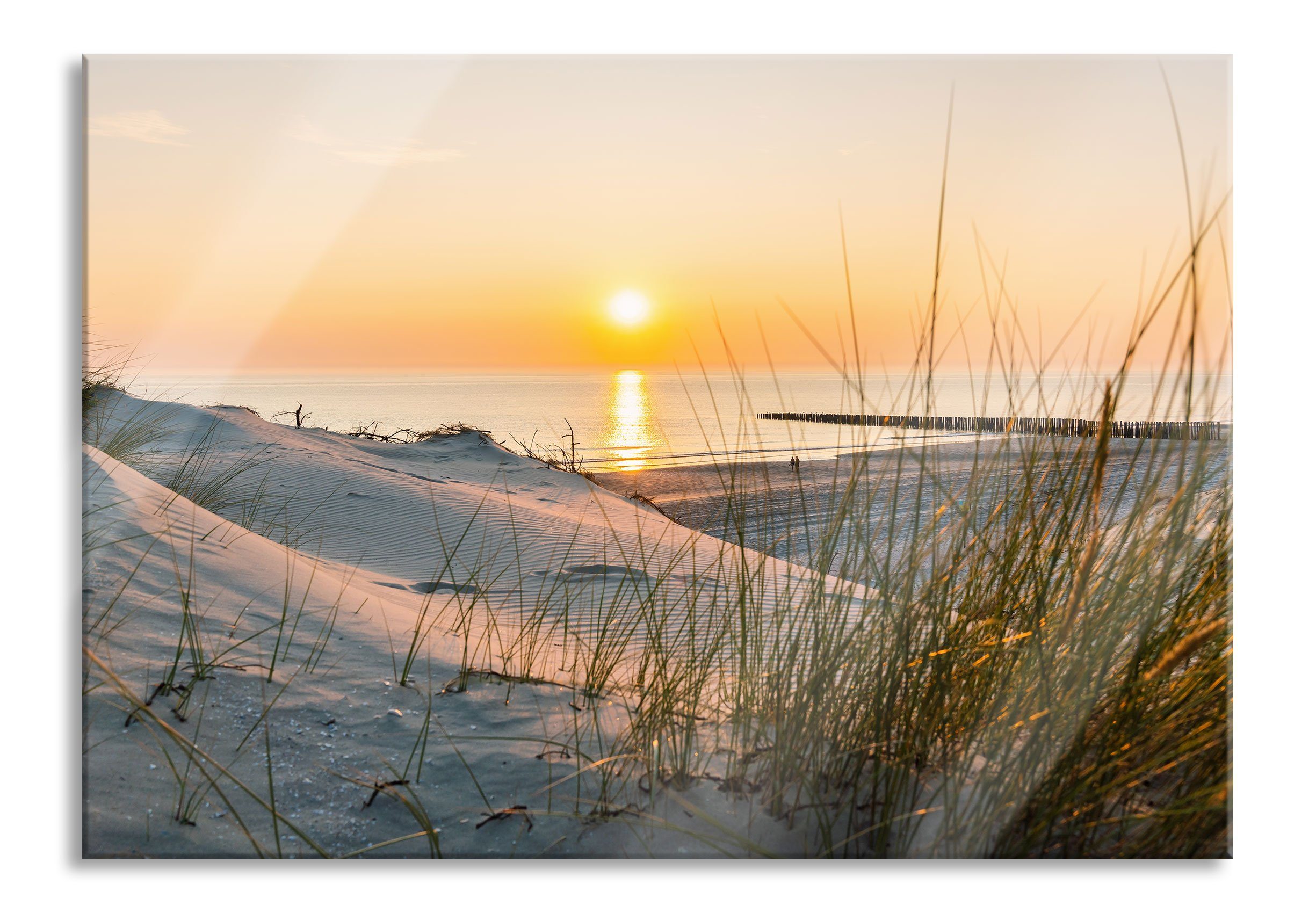 Glasbild Dünenblick auf Meer bei Sonnenuntergang