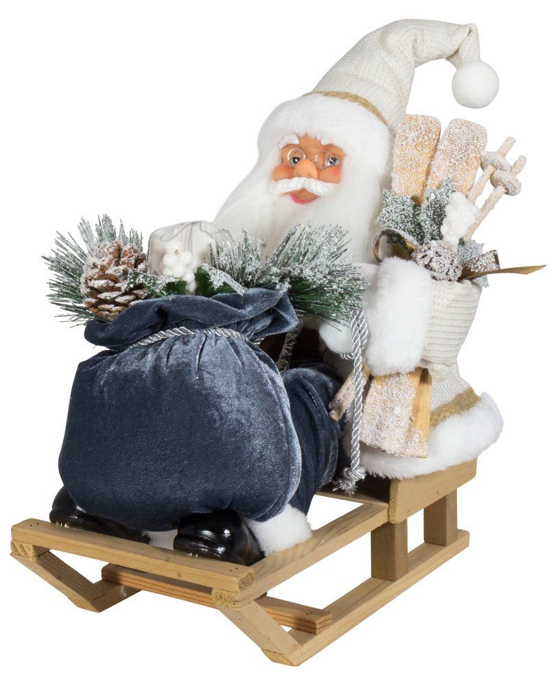Christmas Paradise Weihnachtsmann "Frank" auf Schlitten 45cm (1 St), Weihnachtsdeko Weiß-Grau