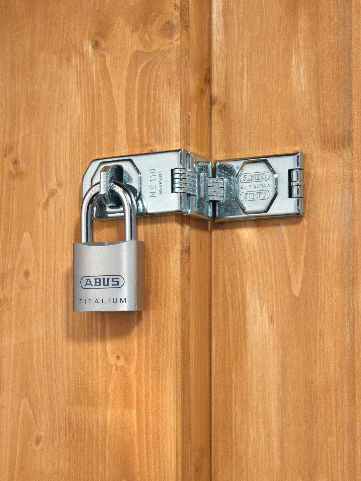 ABUS Vorhängeschloss Vorhangschloss 80TI/40 gl. TITALIUM™- leichter, massiver Schlosskörper, Sicherheitsklasse 7, Bügel aus geh. Stahl, 6-Stift Präzisionszylinder, inkl. 2 Schlüssel