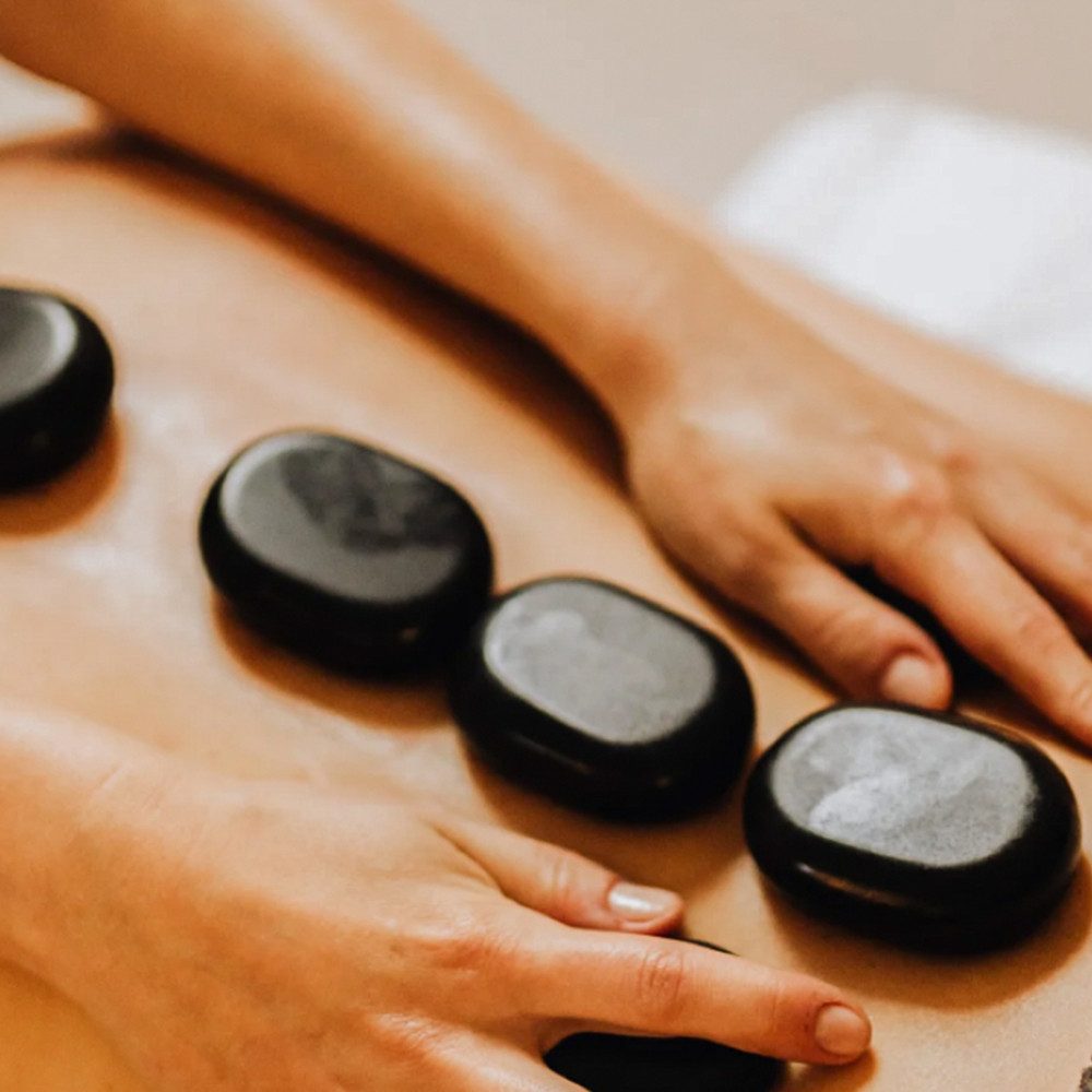 mydays Erlebnisgutschein Hot Stone Massage Weiden in der Oberpfalz, Waerme die unter die Haut geht