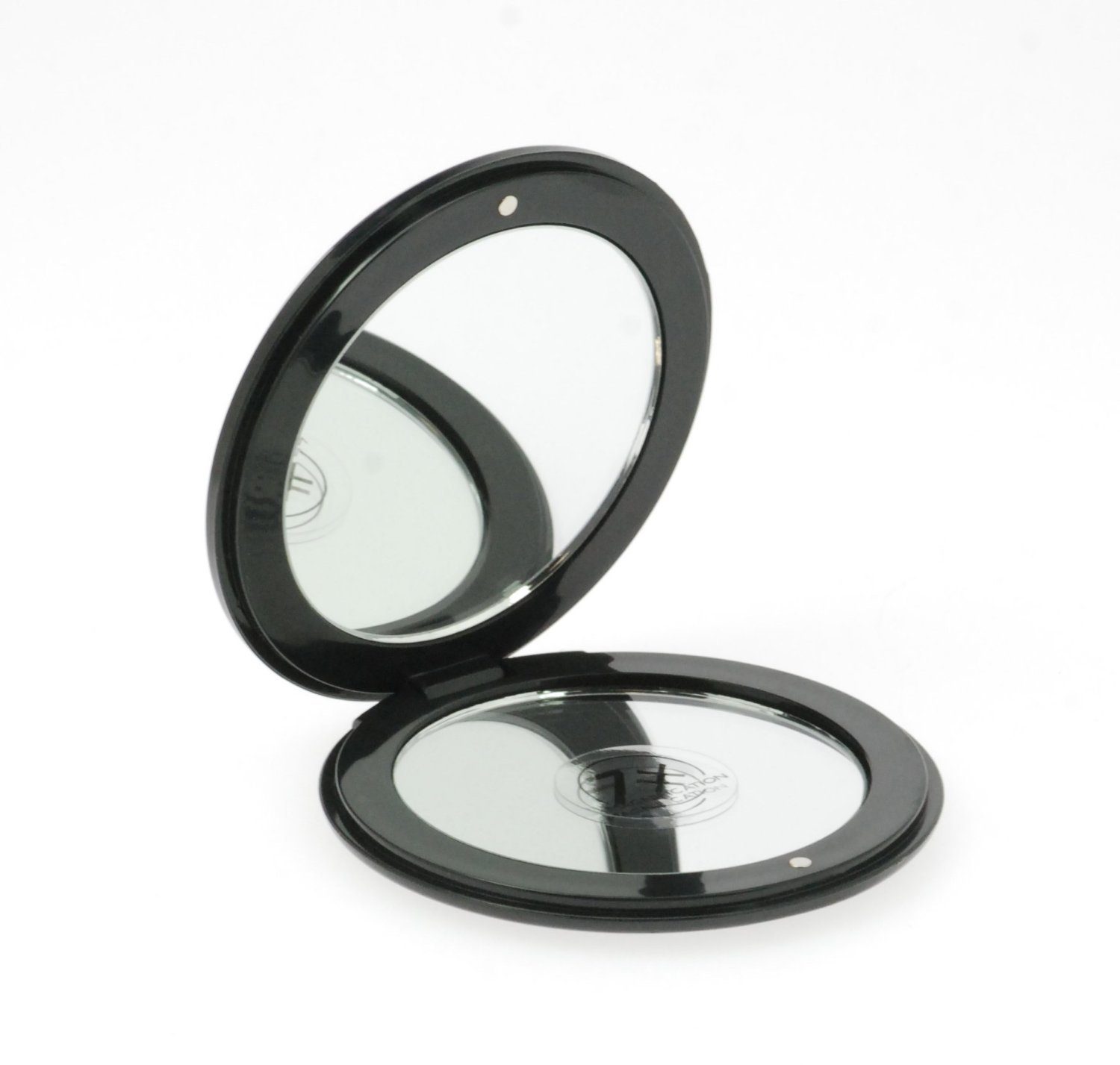 Koskaderm Spiegel Taschen-Spiegel mit 7-fach Vergrößerung und  Magnetverschluss, Ø 8.5 cm