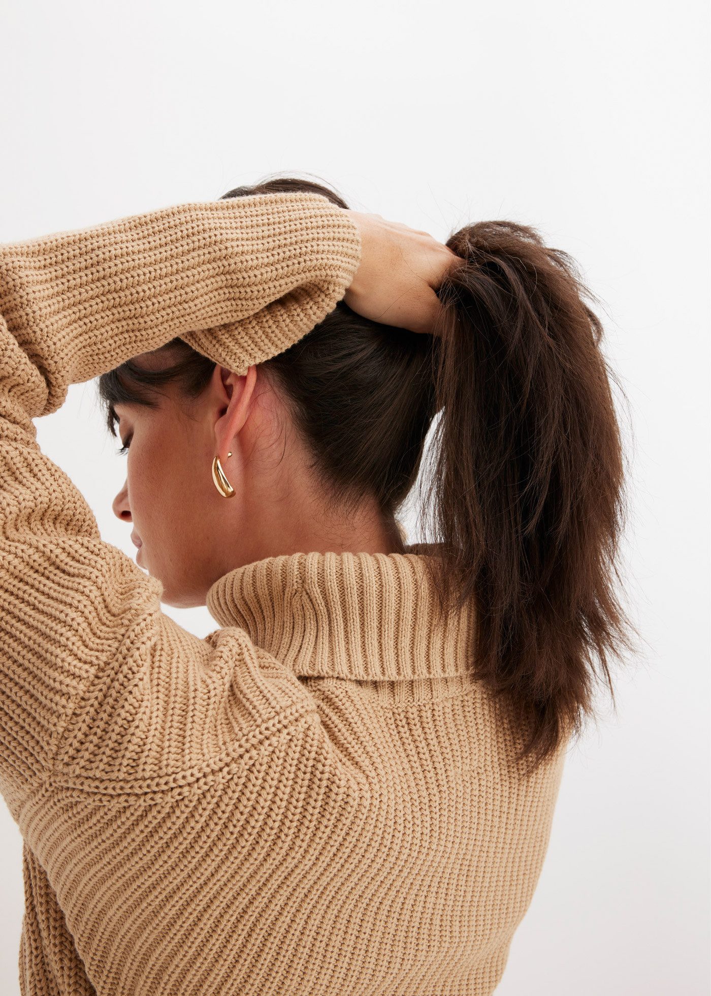 bonprix Rollkragenpullover im Grobstrick aus Baumwolle, Seitenschlitze, hinten länger geschnitten