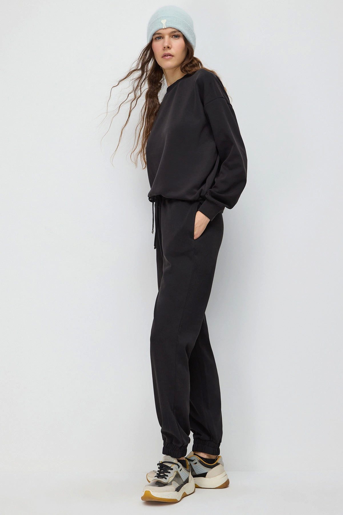 No Matter What Sweatponcho Jogginghose mit elastischem Bund
