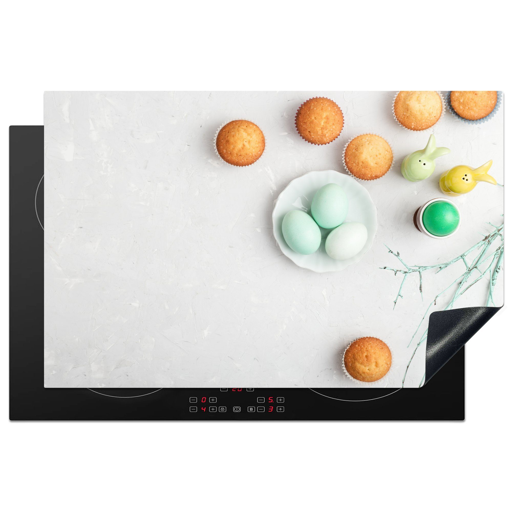 MuchoWow Herdblende-/Abdeckplatte Bemalte Ostereier auf einem hellen Hintergrund zu Ostern, Vinyl, (1 tlg), 81x52 cm, Induktionskochfeld Schutz für die küche, Ceranfeldabdeckung