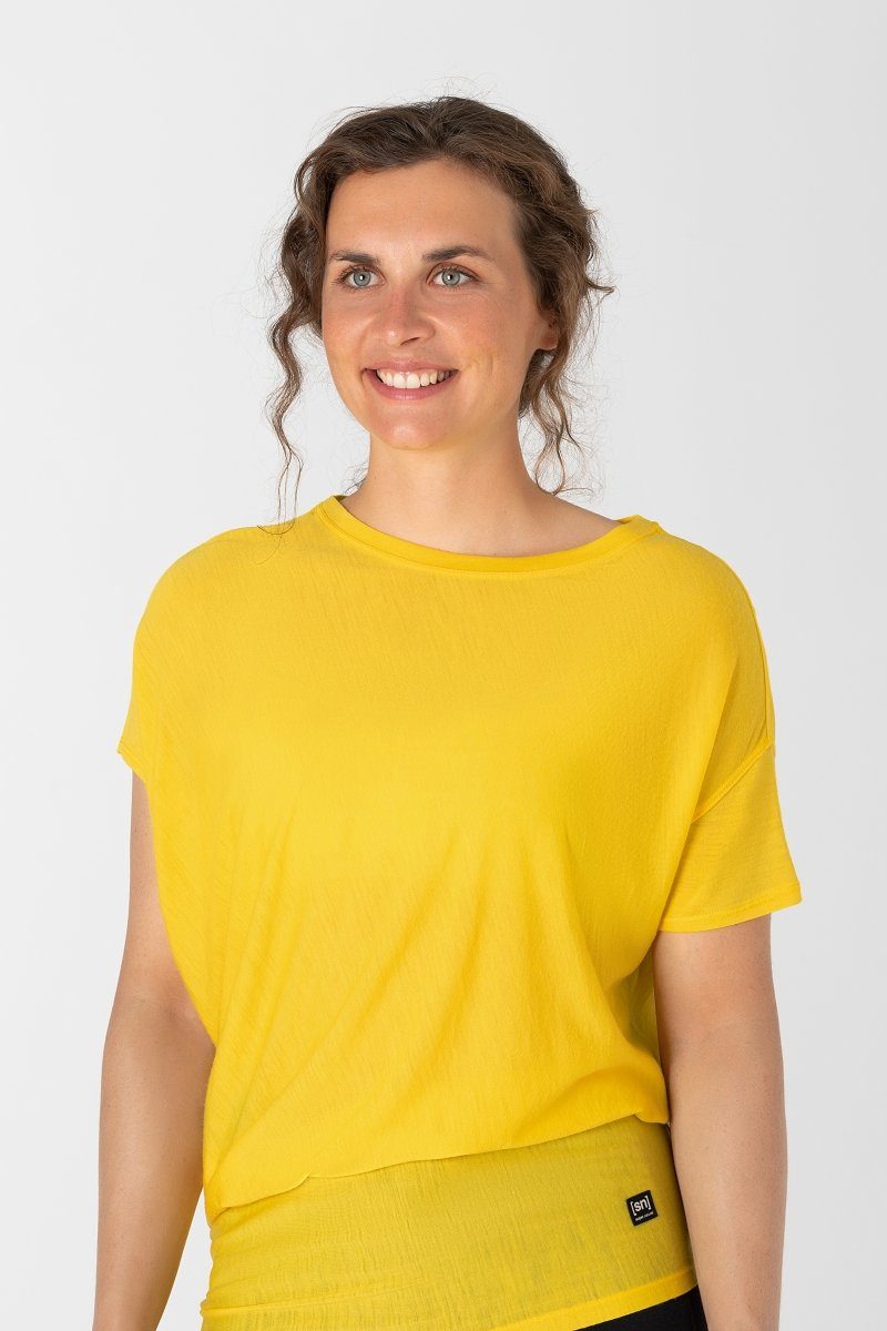 T-Shirt bequemer TEE Merino SUPER.NATURAL W YOGA Merino-Materialmix Illuminating LOOSE T-Shirt