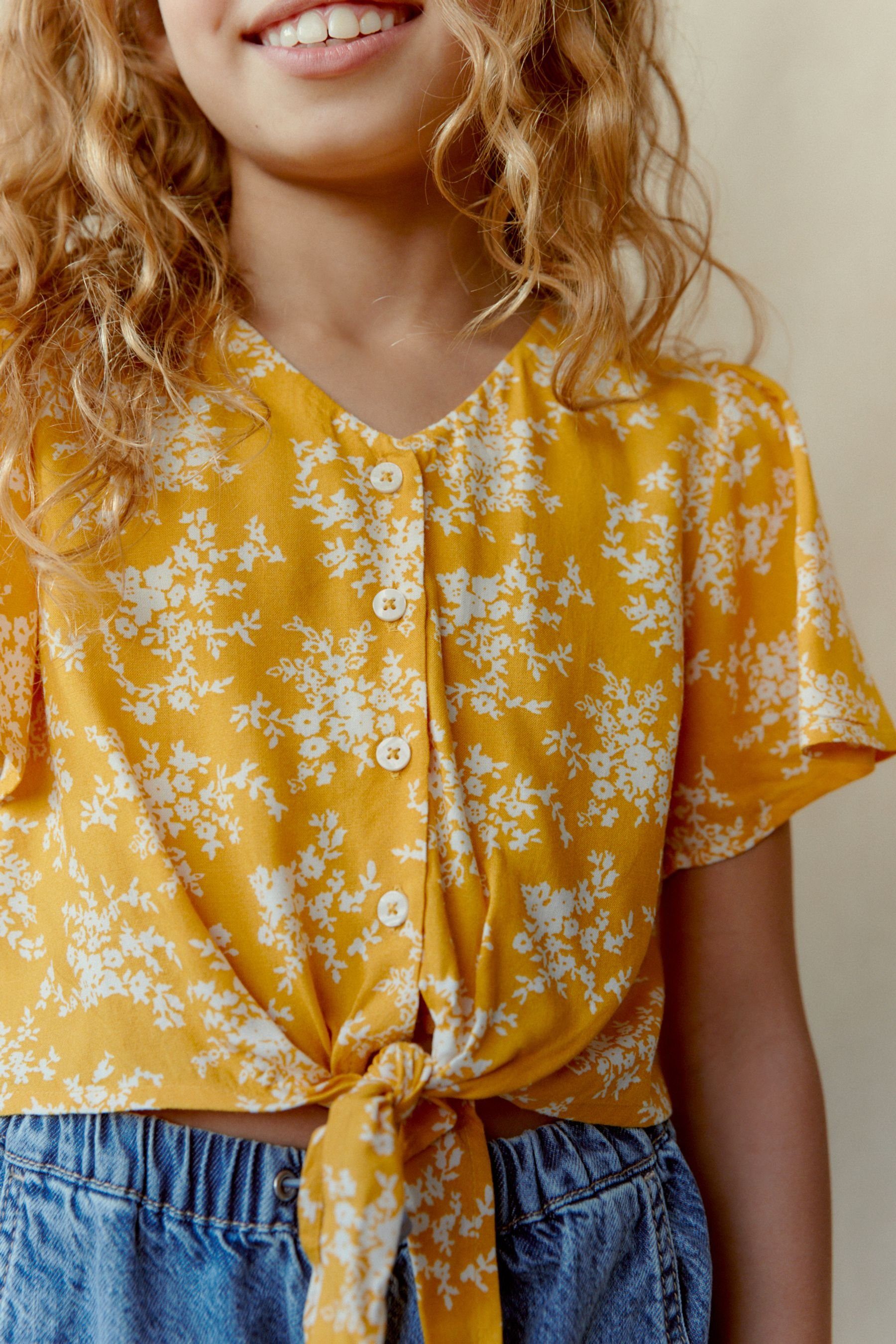 mit Bedrucktes Yellow Bindeband T-Shirt Kurzarmbluse vorne Next (1-tlg) Floral