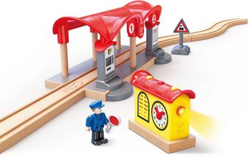Hape Spielzeugeisenbahn-Gebäude Bahnhof mit Aufnahmefunktion, (Set, 5-tlg), aus Holz