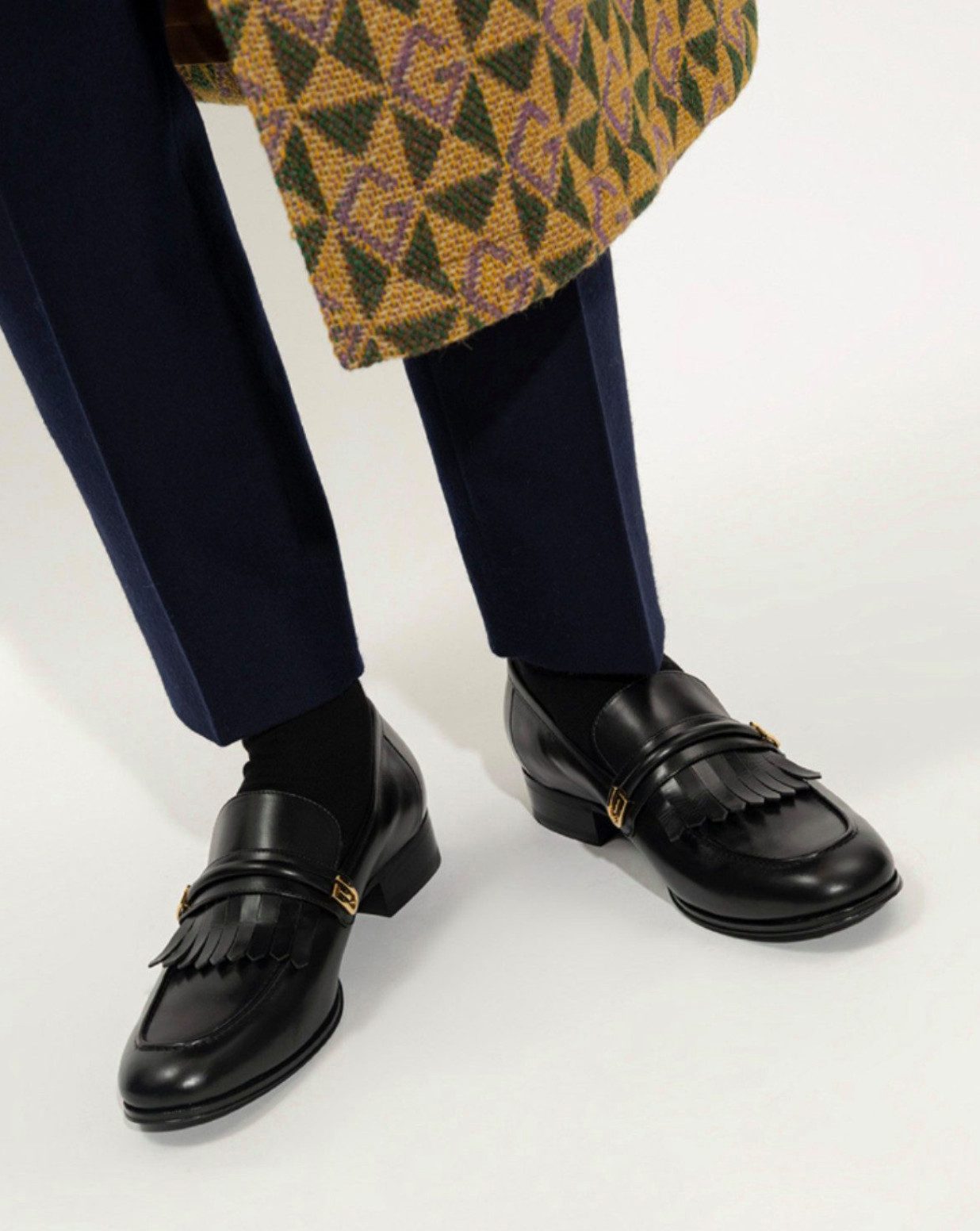GUCCI Schuhe Loafers Mirrored G Gold Waxed Slippers Mokassin Loafer Spiegelnden G-Logos und der dekorativen Fransenverzierung.