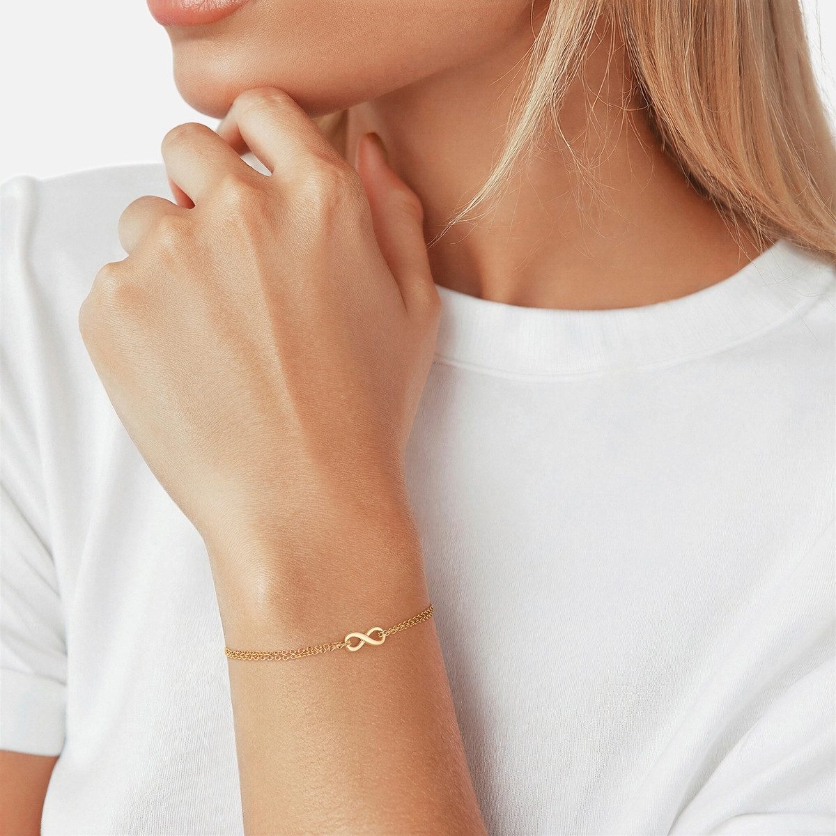 Glanzstücke München Silberarmband Infinity gelbgold