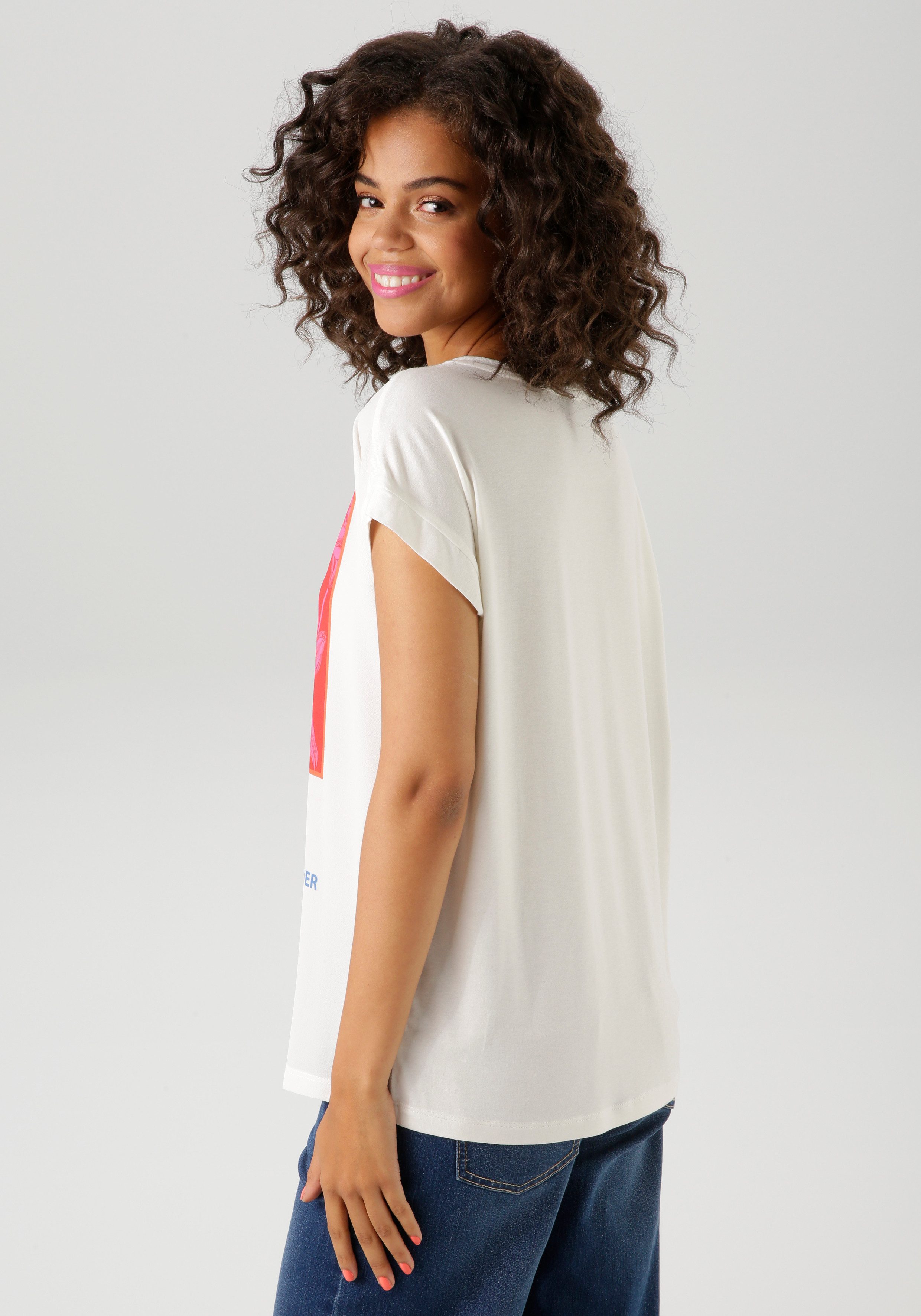 Aniston CASUAL Shirtbluse mit kunstvollen Blumendruck und Statement-Schrift günstig online kaufen