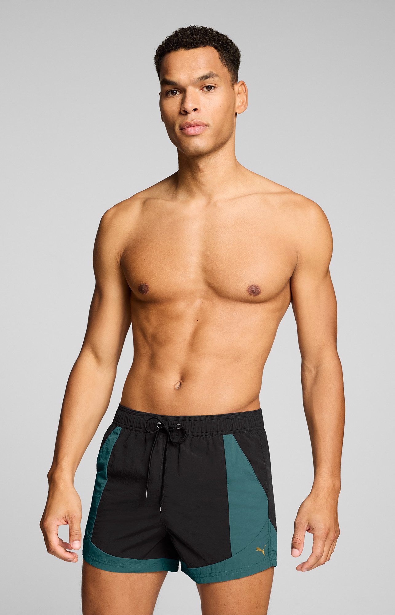 PUMA Badeshorts mit Kordelzug und seitlichen Taschen