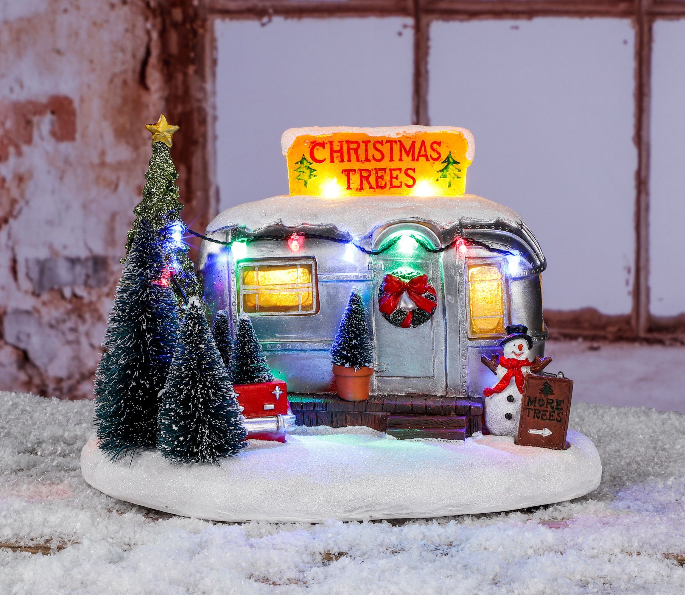 Spetebo Weihnachtsszene LED Weihnachtsstadt Szene "Baumverkauf" - 25 cm, beleuchtet