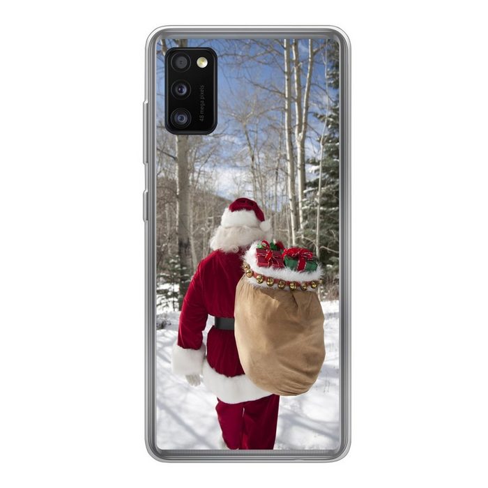 MuchoWow Handyhülle Der Weihnachtsmann geht mit einem Sack voller Weihnachtsgeschenke Handyhülle Samsung Galaxy A41 Smartphone-Bumper Print Handy