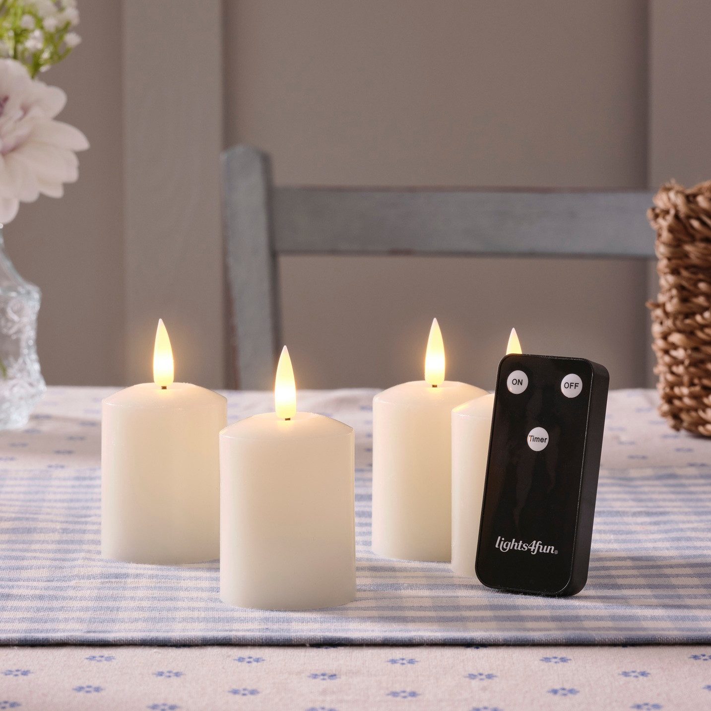 Lights4fun LED-Kerze 4er Set TruGlow® LED Votivkerzen Echtwachs elfenbeinfarben wiederaufla