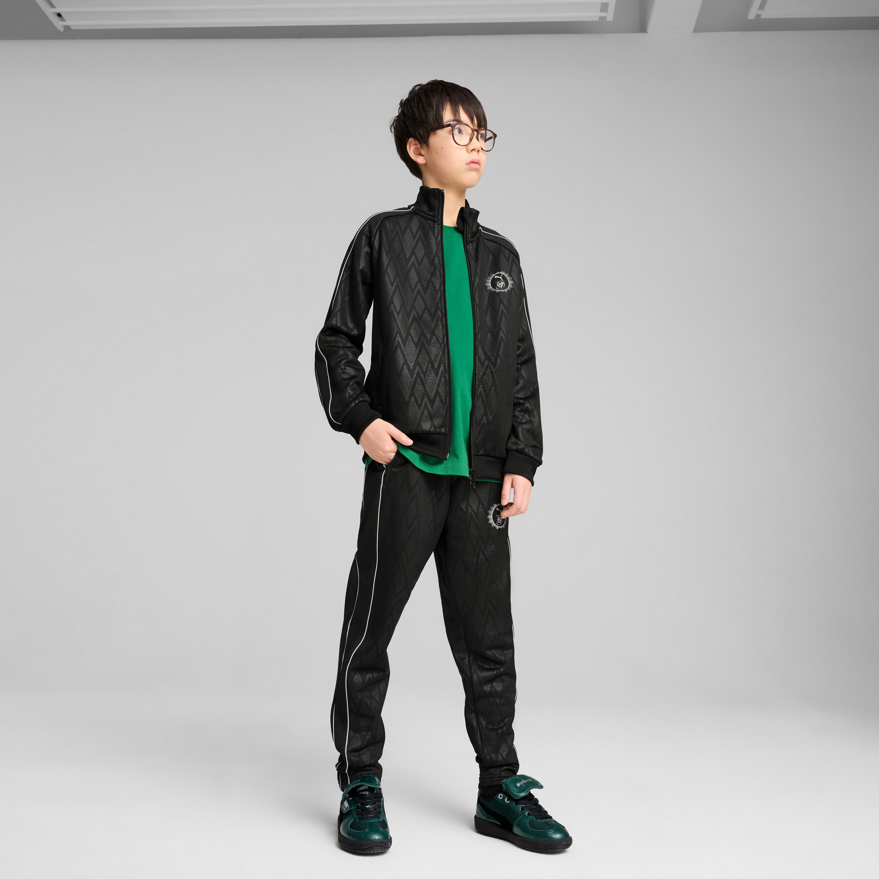 PUMA Trainingshose X HARRY POTTER T7 TRACK PANTS TR sportlicher Stil, mit Leistentasche und Gesäßtasche, Regular Fit