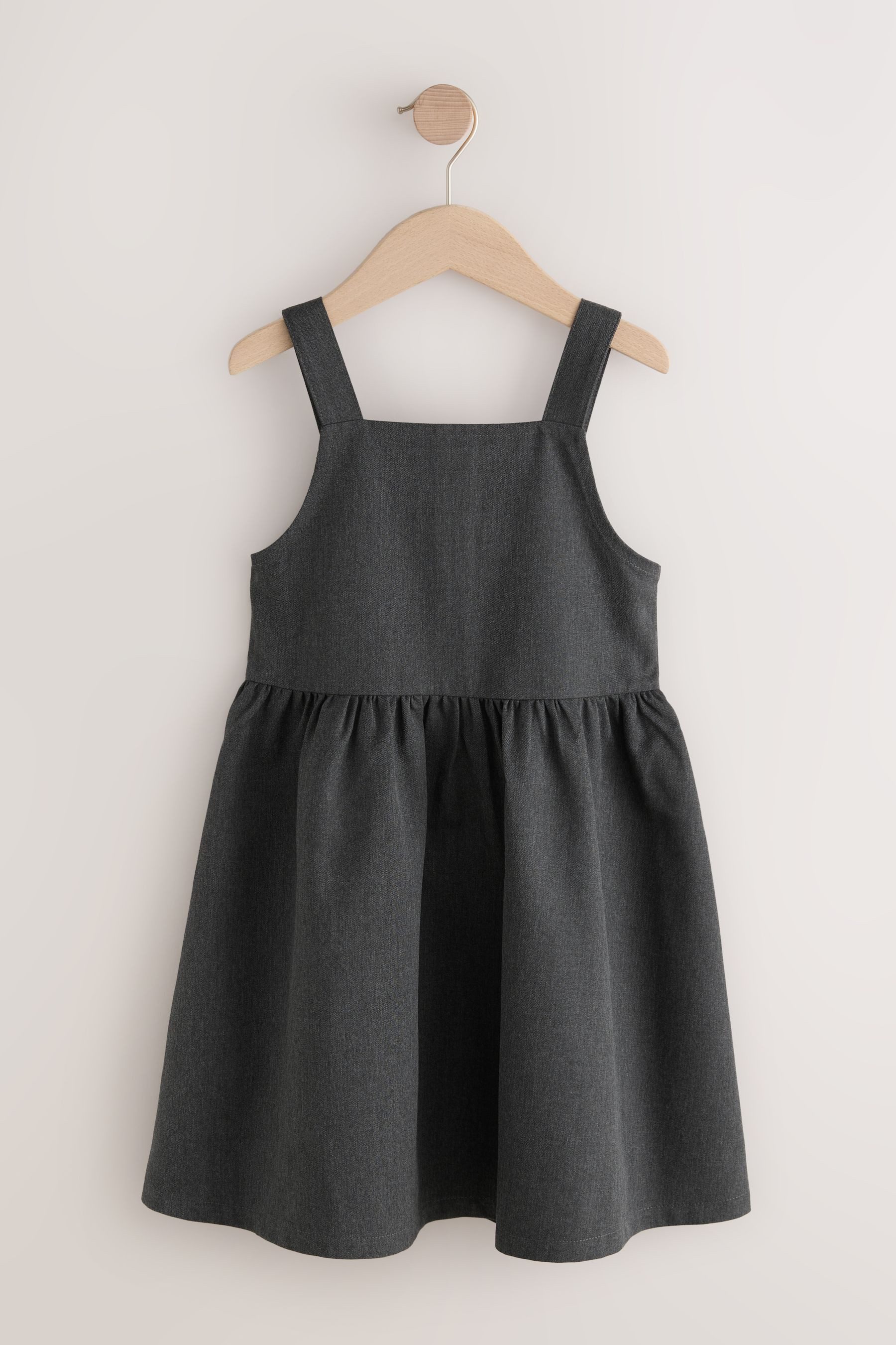 Next Latzkleid Geknöpftes Latzkleid für die Schule mit Stickerei (1-tlg)