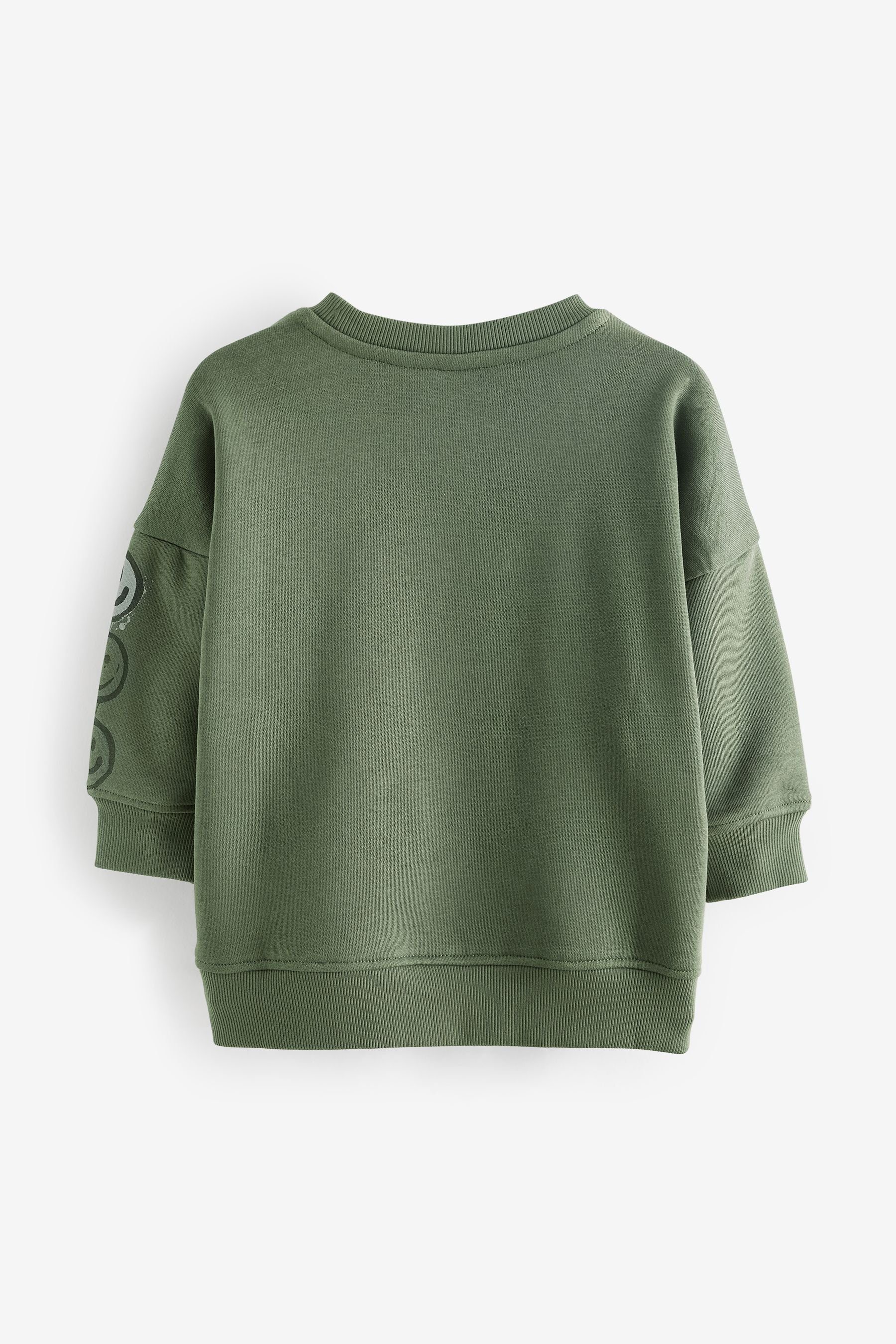 Rundhals-Sweatshirt mit Graffiti Khaki Figur Next (1-tlg) Green Sweatshirt