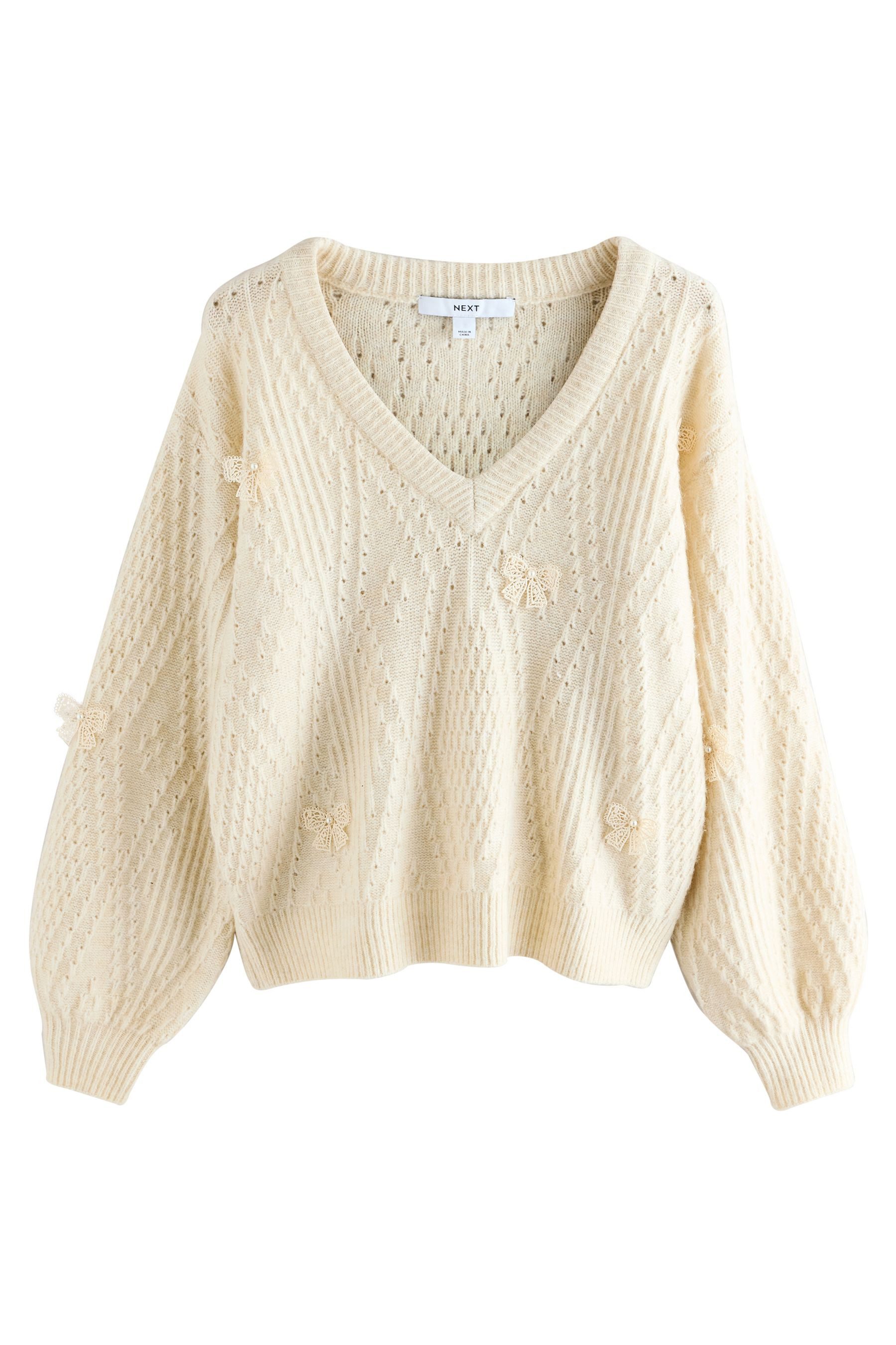 Next V-Ausschnitt-Pullover Argyle-Pullover mit V-Ausschnitt und Schleife (1-tlg)