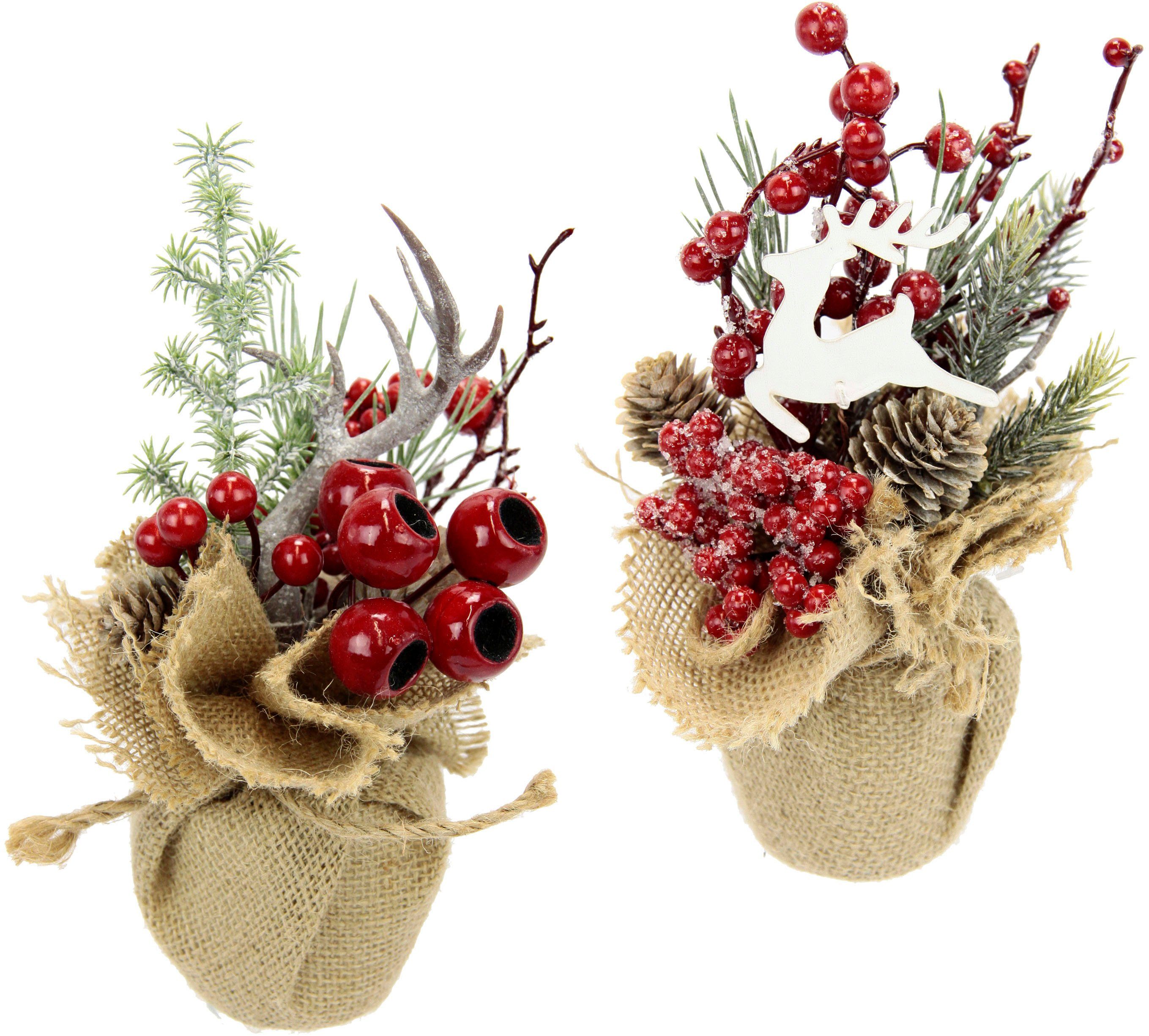 Winterliche Kunstpflanze Weihnachtsgesteck in Jute, Weihnachtsdeko im 2er  Set, Tanne, I.GE.A., Höhe 20 cm, Kunstblumen-Arrangement 1x mit Horn und 1x  mit Hirsch