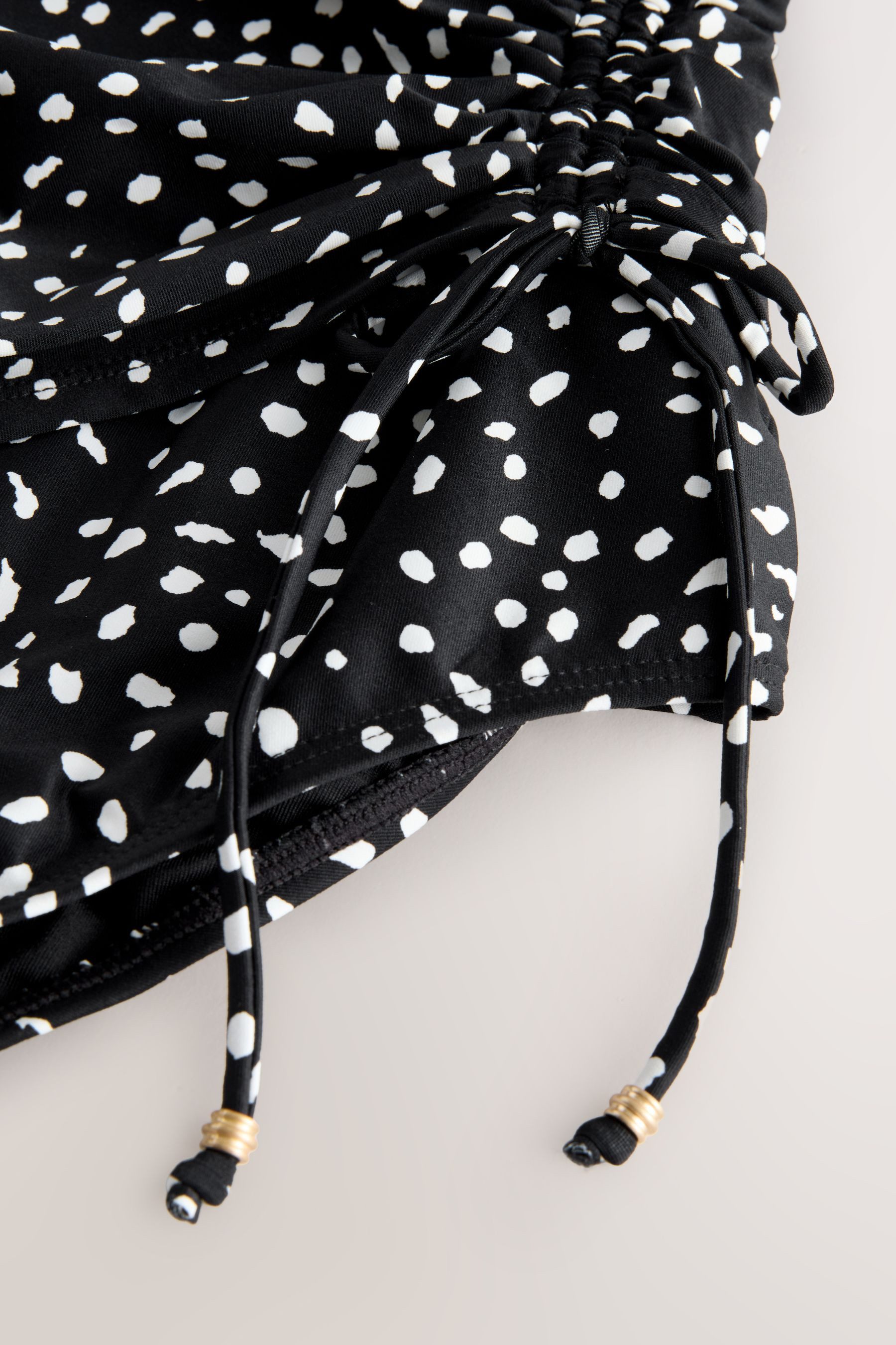 Next Badeanzug Bauchformender Badeanzug mit seitlicher Raffung (1-St) günstig online kaufen