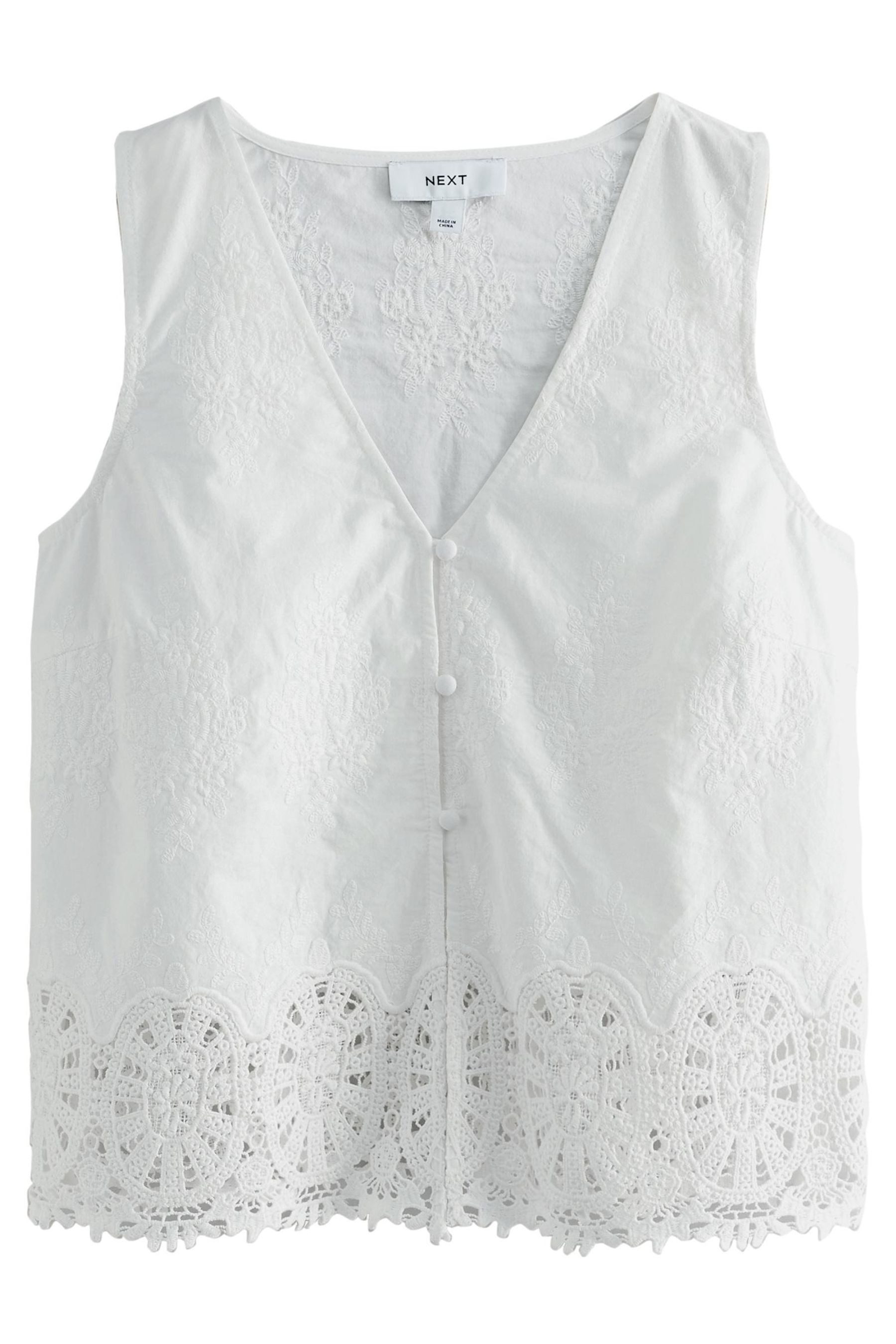 Stricktop Weste mit Häkelbesatz