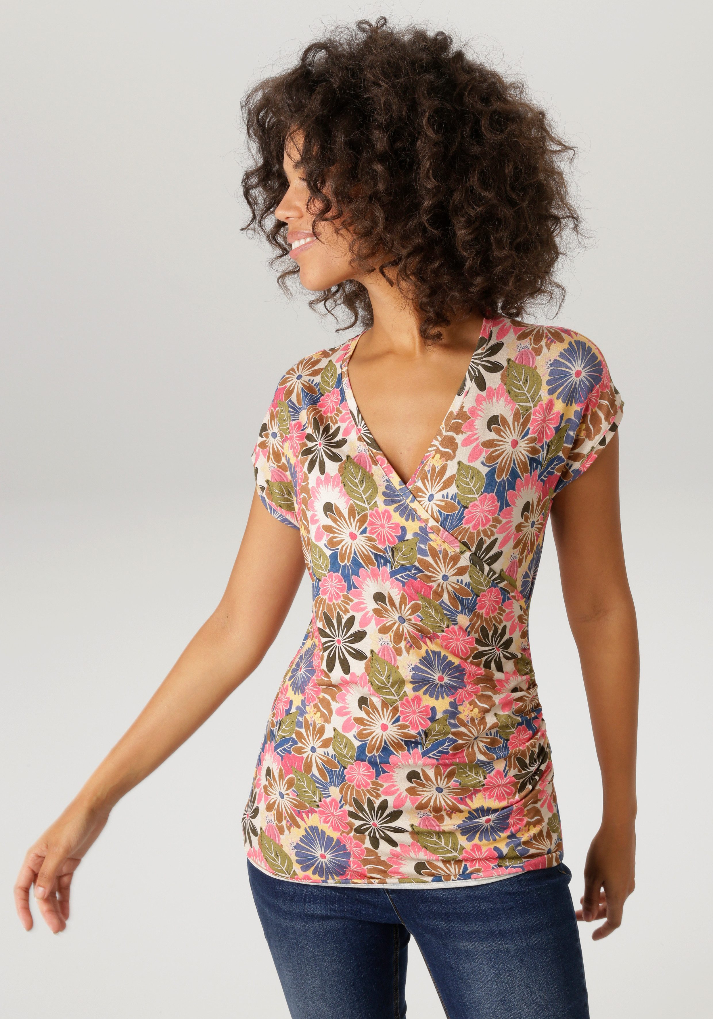 Aniston CASUAL T-Shirt mit farbenfrohen Blüten bedruckt - NEUE KOLLEKTION. € 24,99, (€ 24,99 pro 1 Stk).