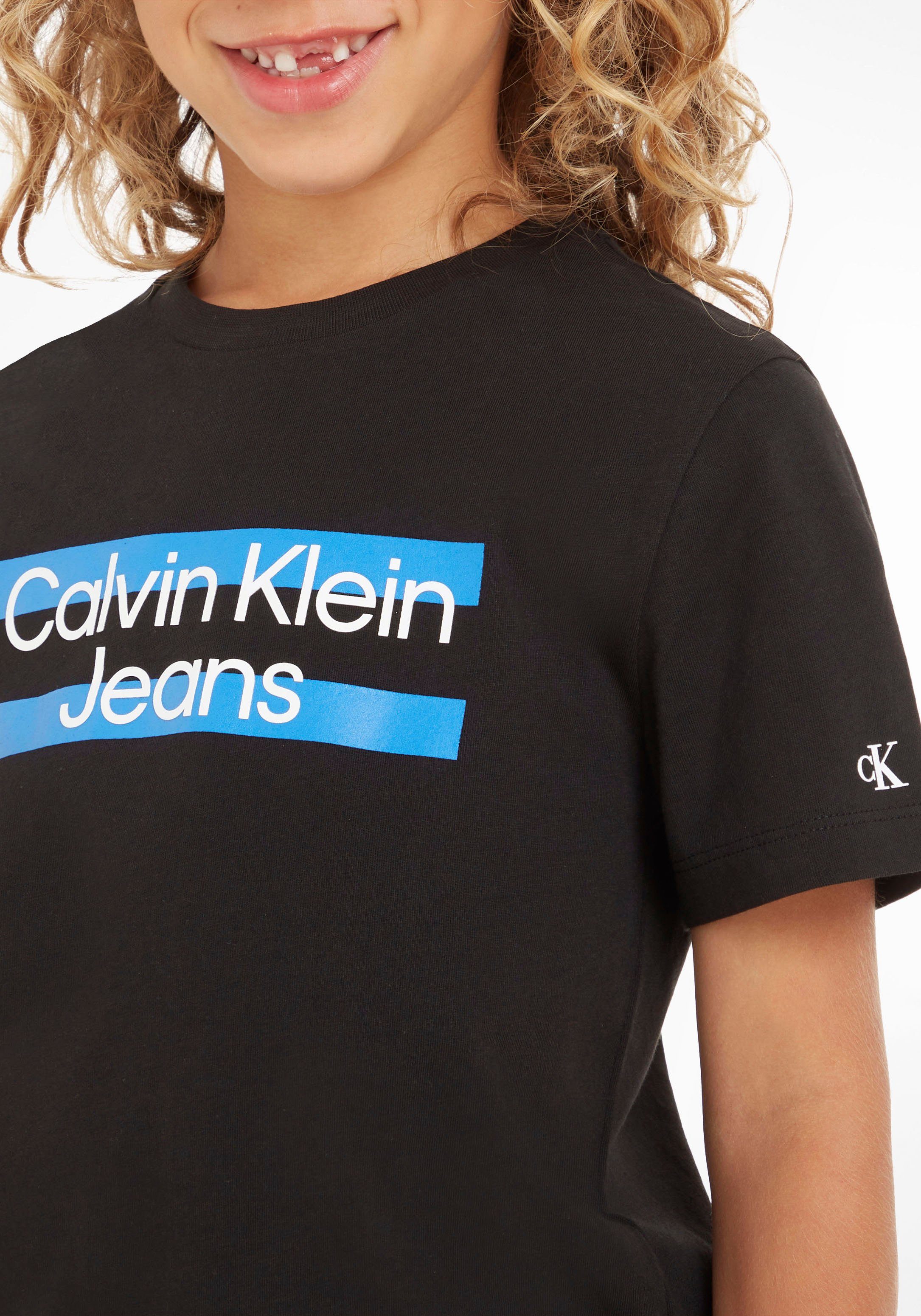 Calvin Klein Jeans T-Shirt Klein der auf Logodruck Brust Calvin mit schwarz