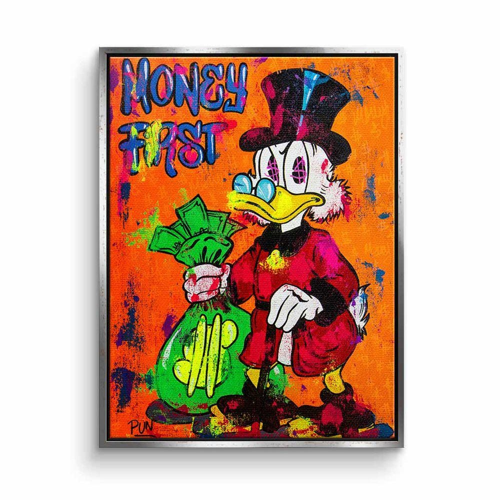 DOTCOMCANVAS® Leinwandbild, Leinwandbild Comic Dagobert Duck money first Scrooge McDuck orange Bür silberner Rahmen