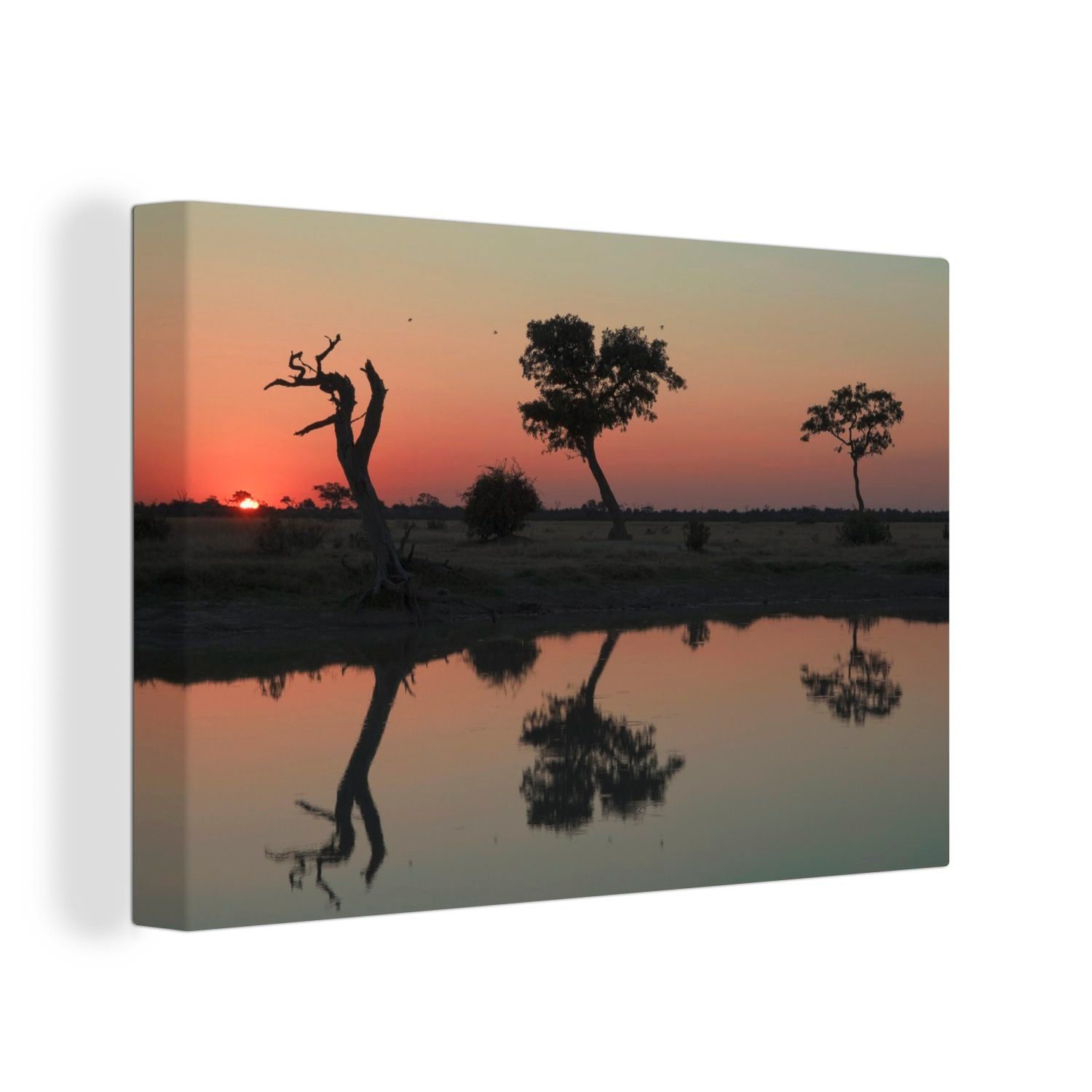 OneMillionCanvasses® Leinwandbild Sonnenuntergang über dem Wasserloch im Chobe-Nationalpark, (1 St), Wandbild Leinwandbilder, Aufhängefertig, Wanddeko, 30x20 cm | Leinwandbilder