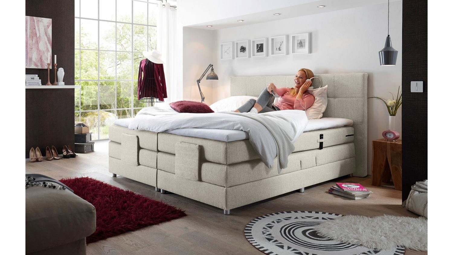 Bega Consult Boxspringbett Boxspringbett Manolo 2 in Stoff creme mit Motor 180x200 cm
