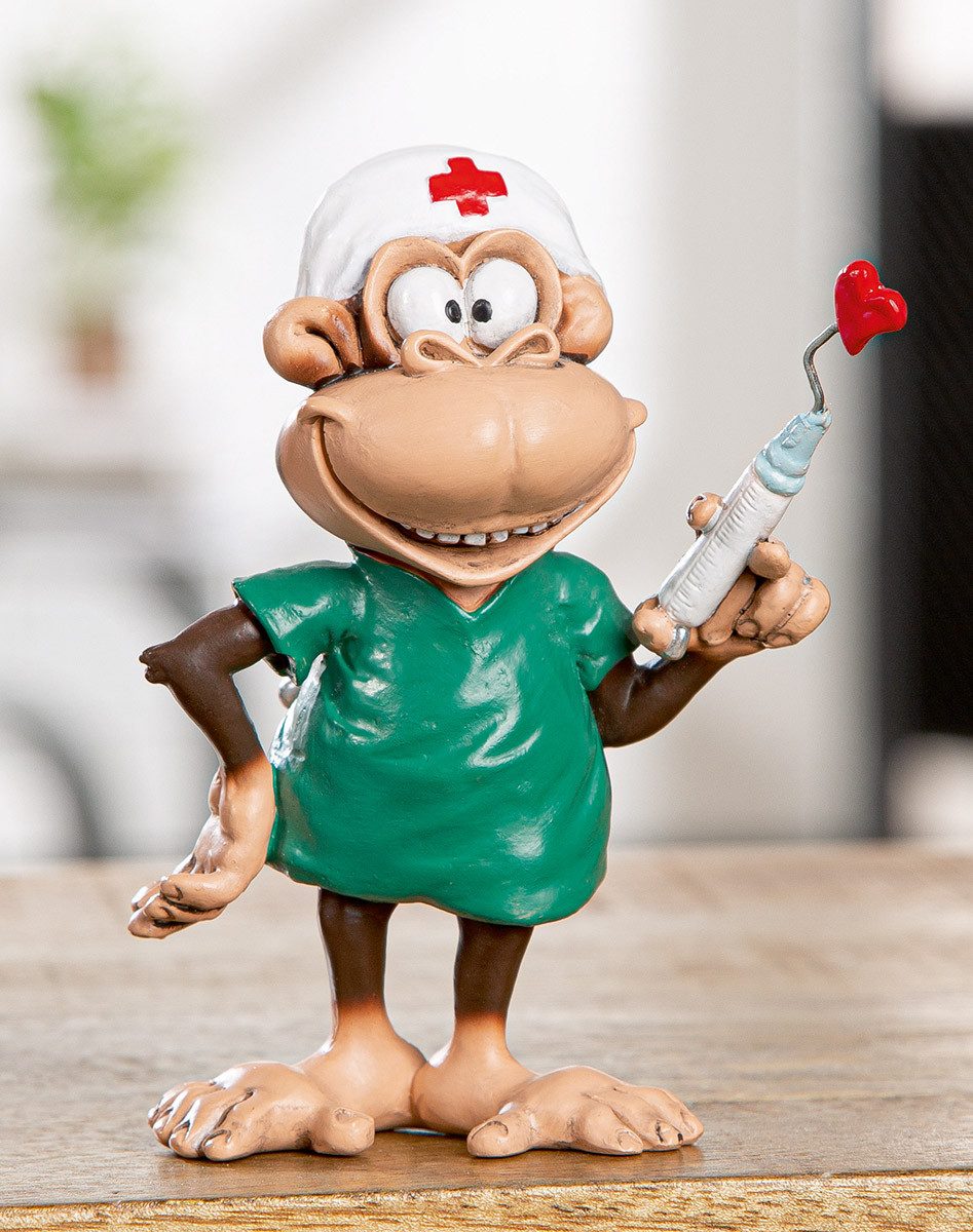 MF Comicfigur Nurse Monkey Affenfigur Pfleger mit Spritze Deko Blau Braun 12cm (1 St)
