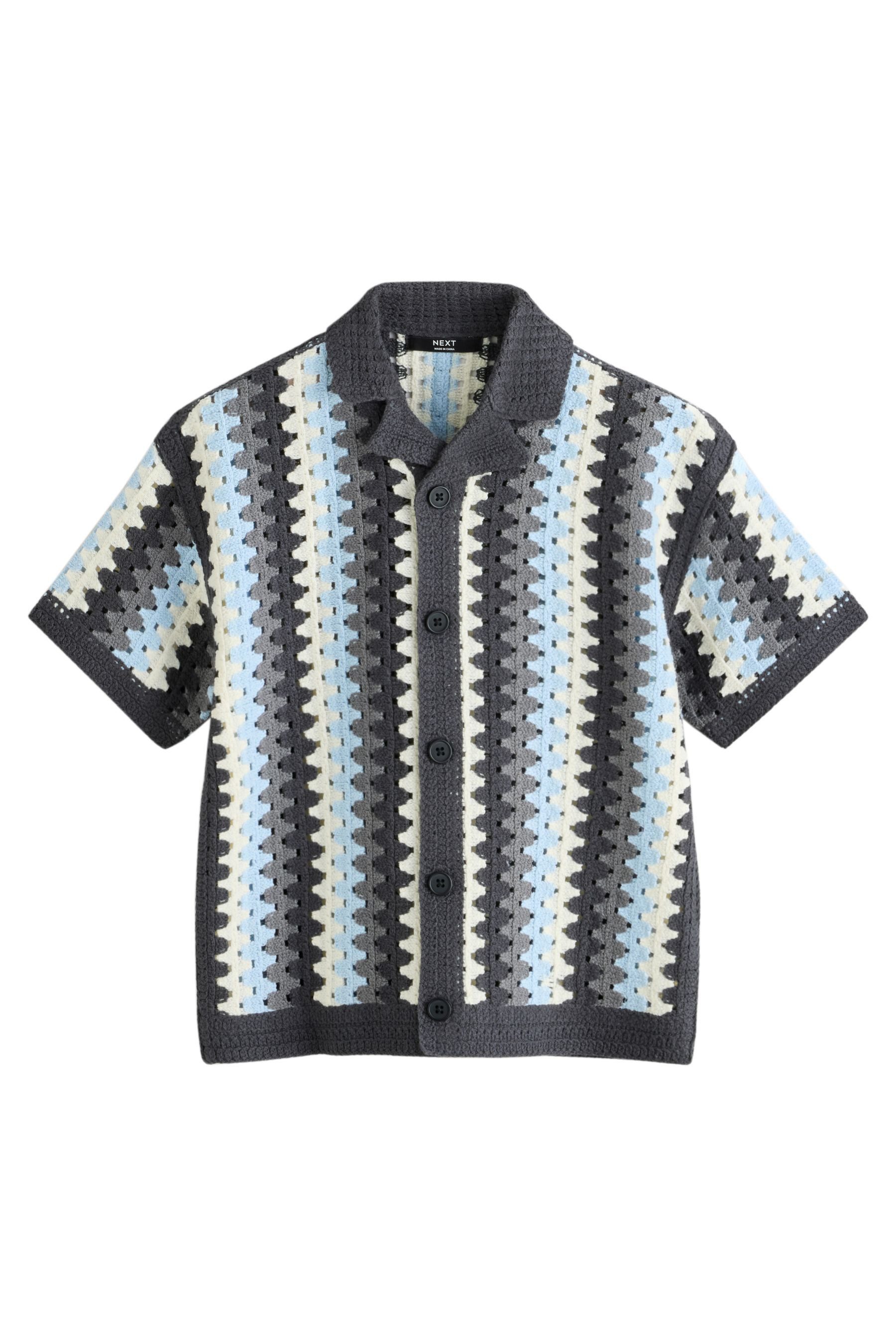 Polokragenpullover Strukturiertes gestricktes Polohemd mit Häkelei
