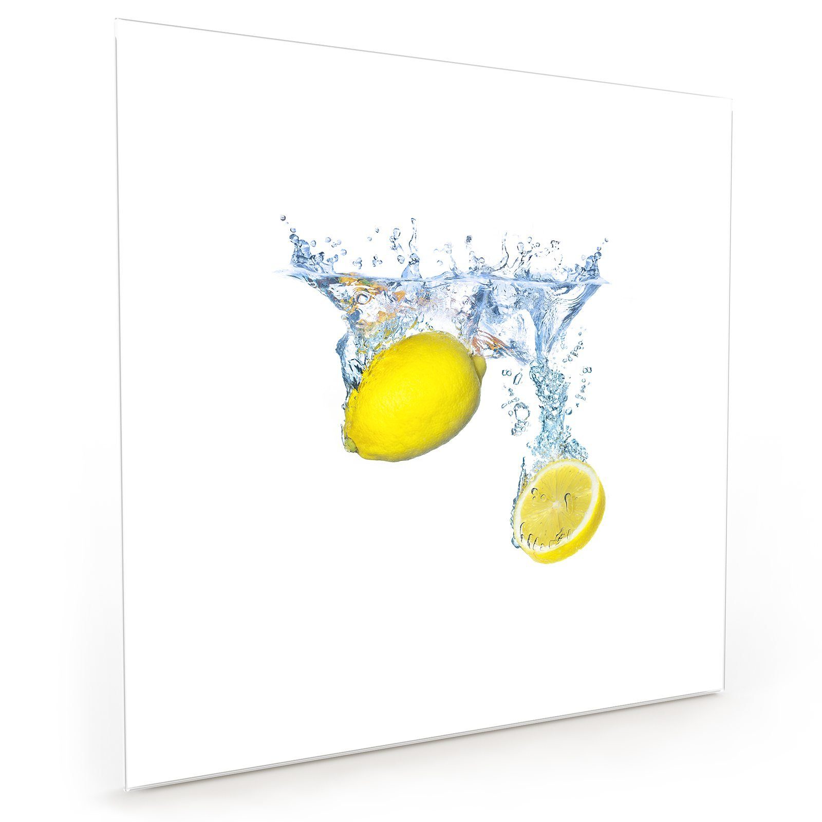 Primedeco Küchenrückwand Küchenrückwand Spritzschutz Glas mit Motiv Zitronen fallen in Wasser