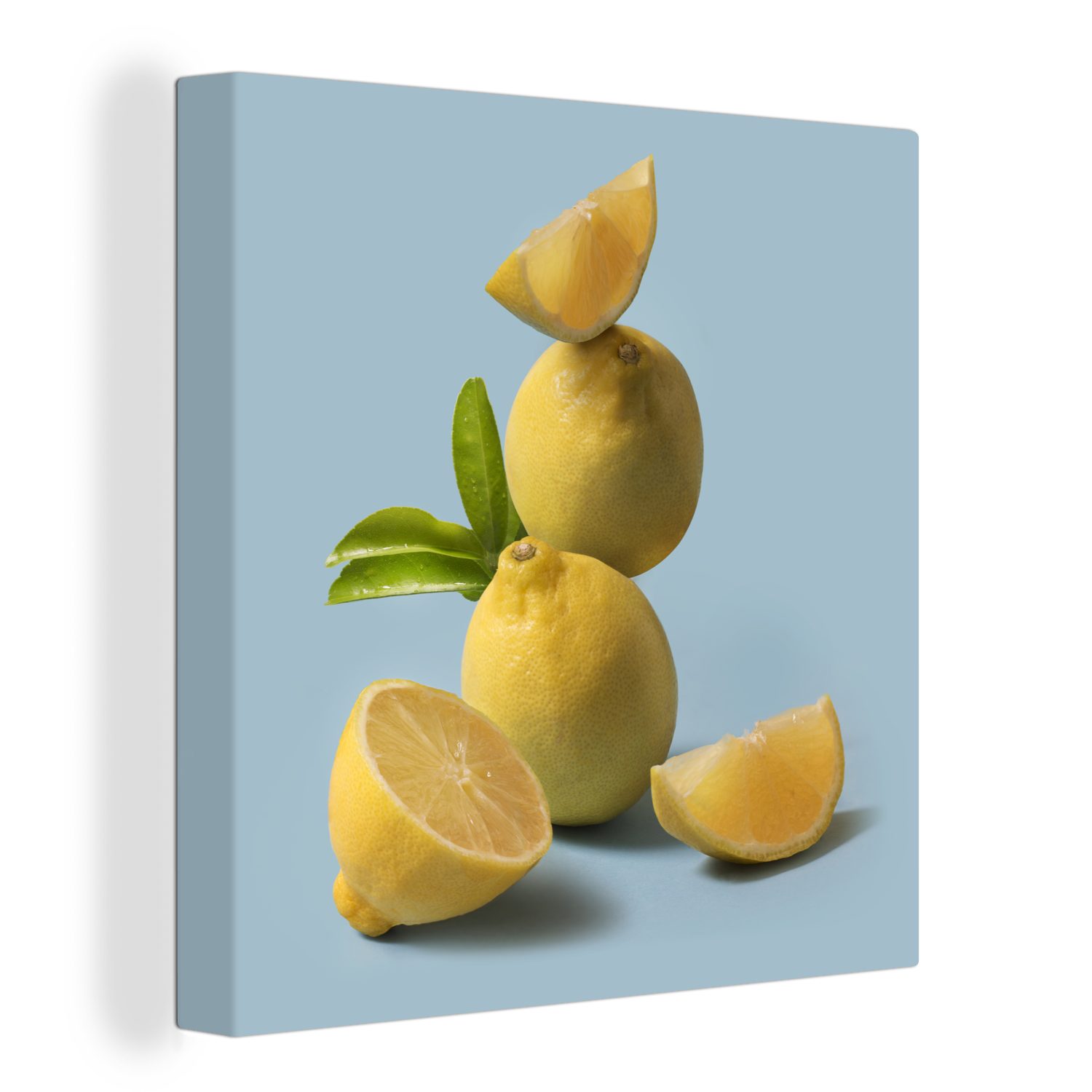 OneMillionCanvasses® Leinwandbild Komposition von Zitronen auf hellblauem Hintergrund, (1 St), Leinwand Bilder für Wohnzimmer Schlafzimmer