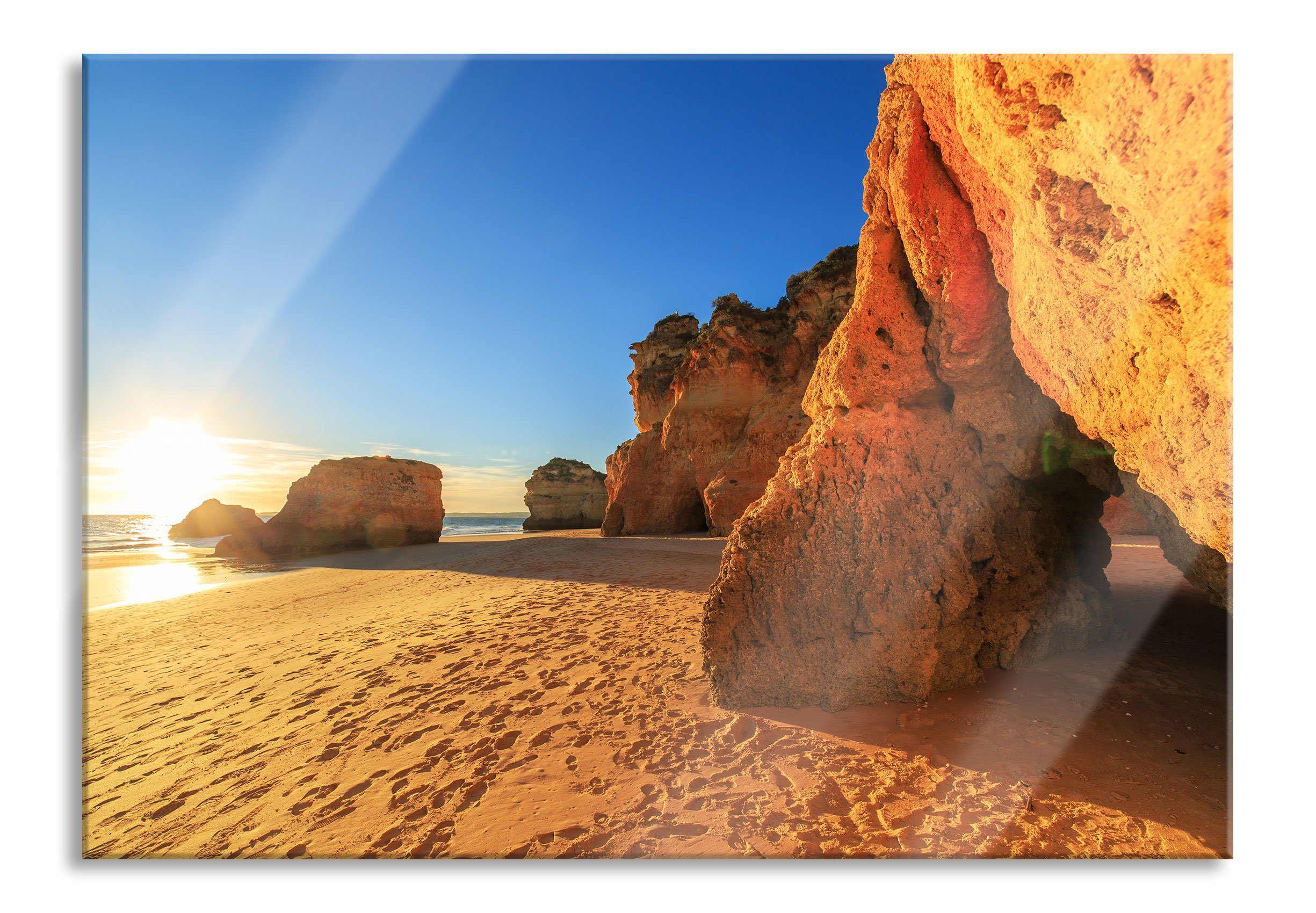 Glasbild Sonnenuntergang an Felsen