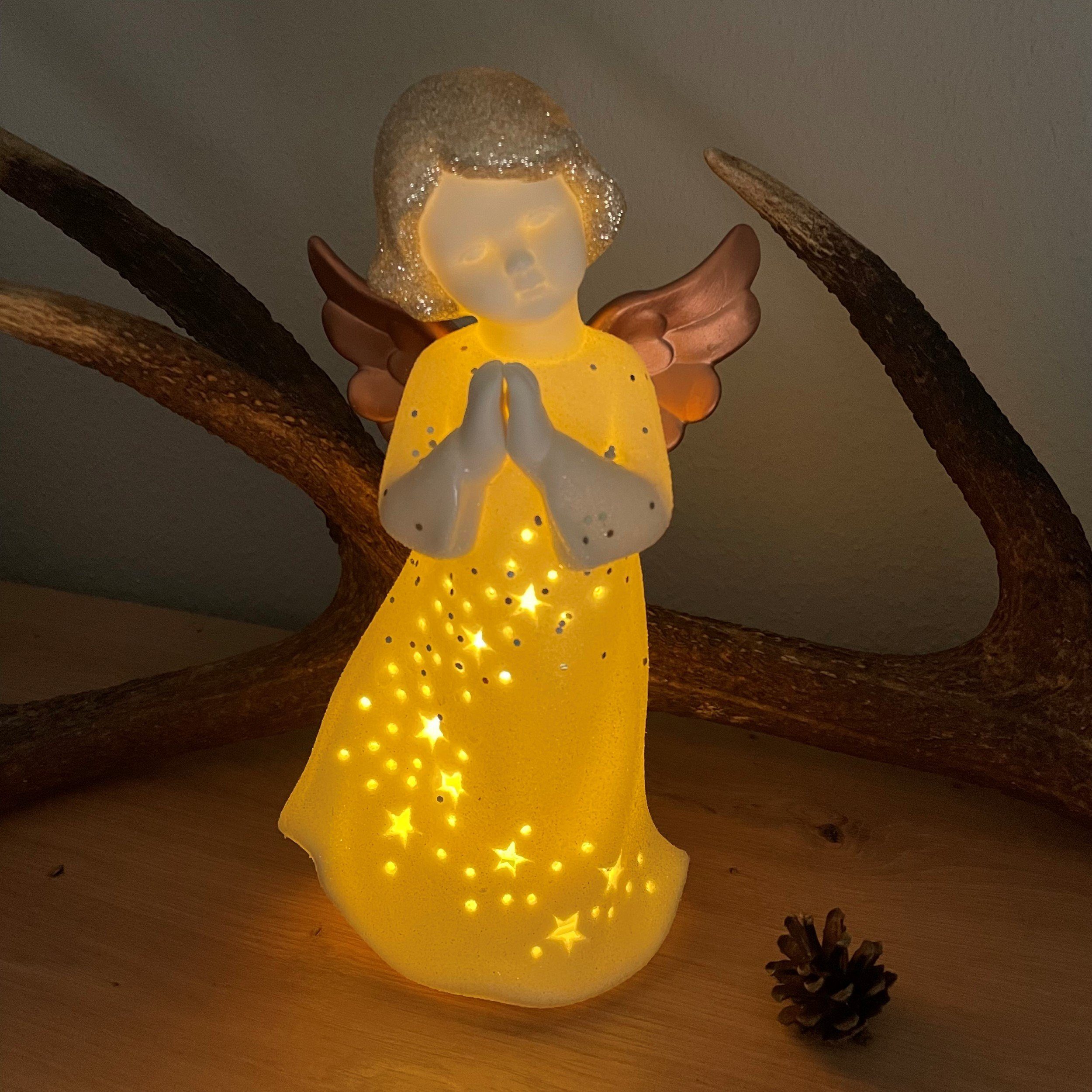& Keramik Weihnachtsdeko 662, LED als Sterne aus Dekoobjekt Glitzerüberzug LED Flügel Beleuchtung ausgestanzte cm, Engel mit LED Maße: Kupfer-farbend, fest Timer warmweiß, integriert, 27x14x11 Online-Fuchs sind am Kleid,