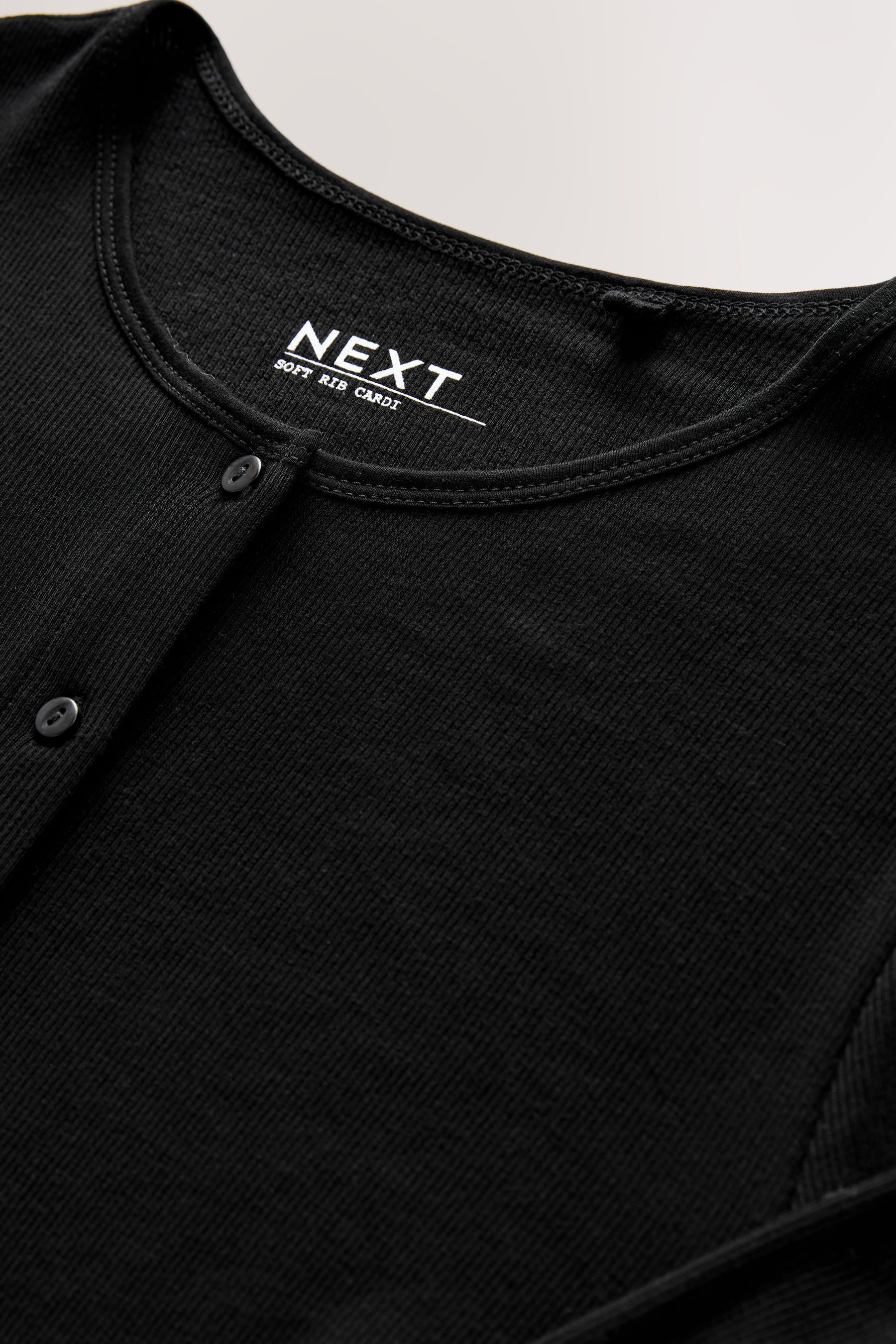 Next Strickjacke Gerippte geknöpfte Strickjacke mit günstig online kaufen